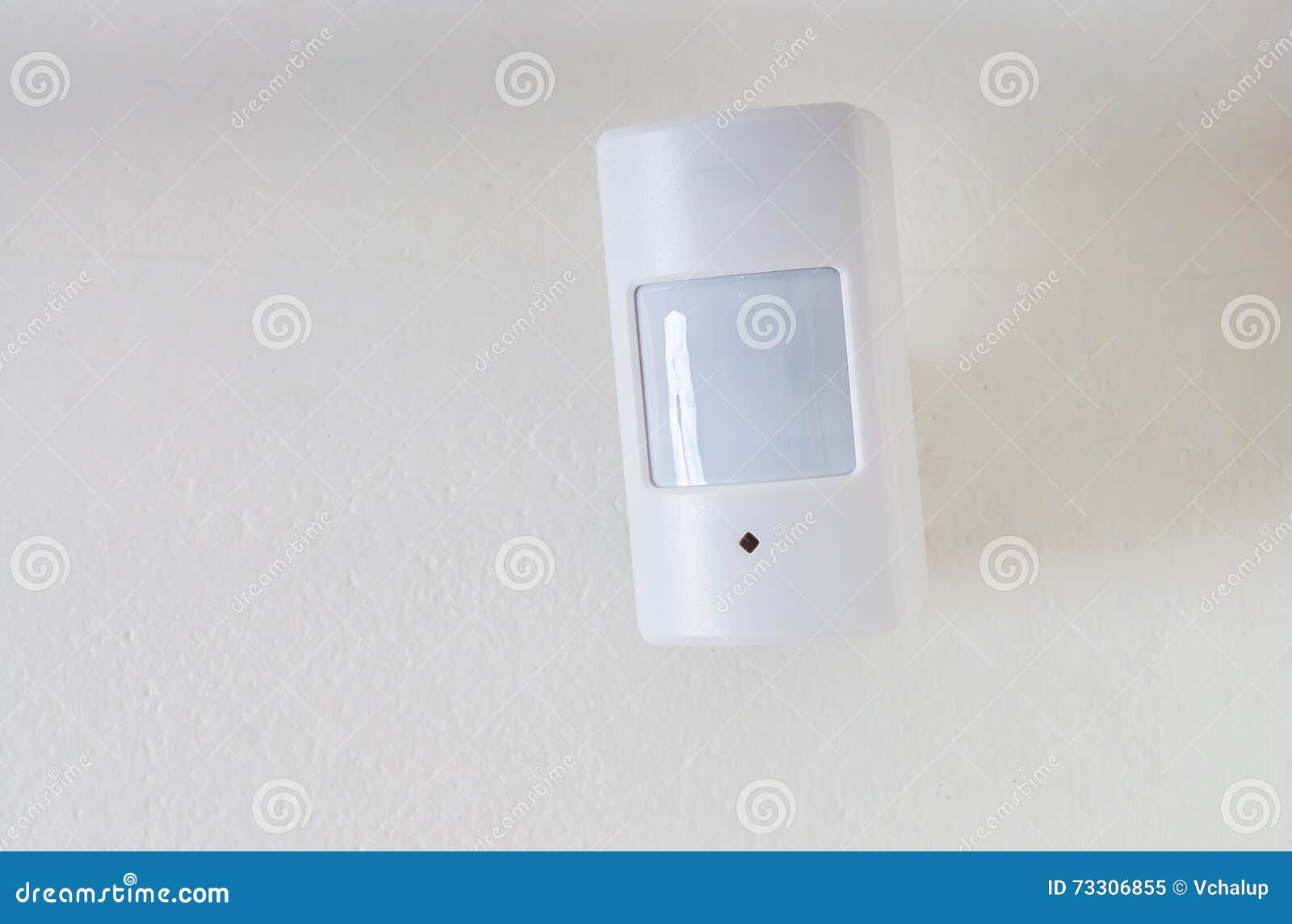 motion sensor or detector for security system mounted on wall