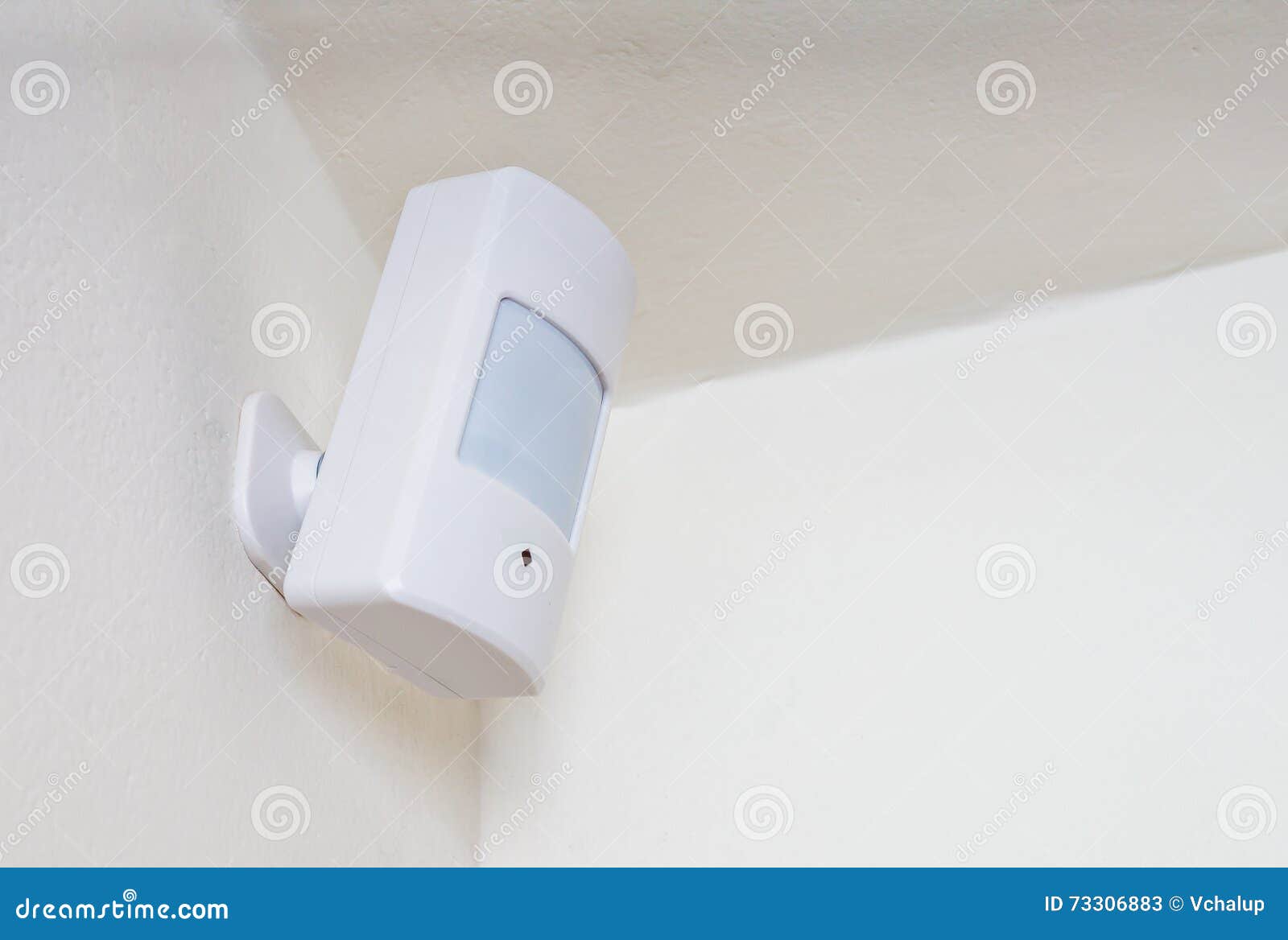motion sensor or detector for security system mounted on wall