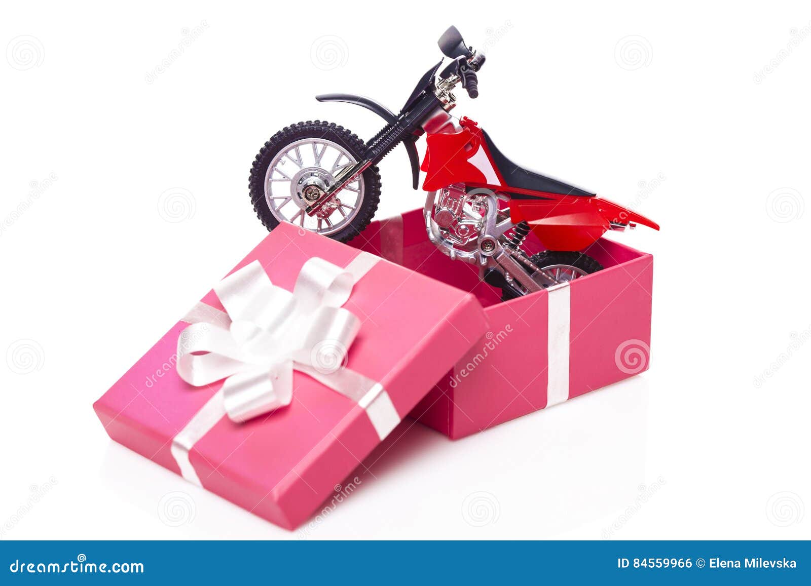 Moto dans le boîte-cadeau photo stock. Image du cadeau - 84559966