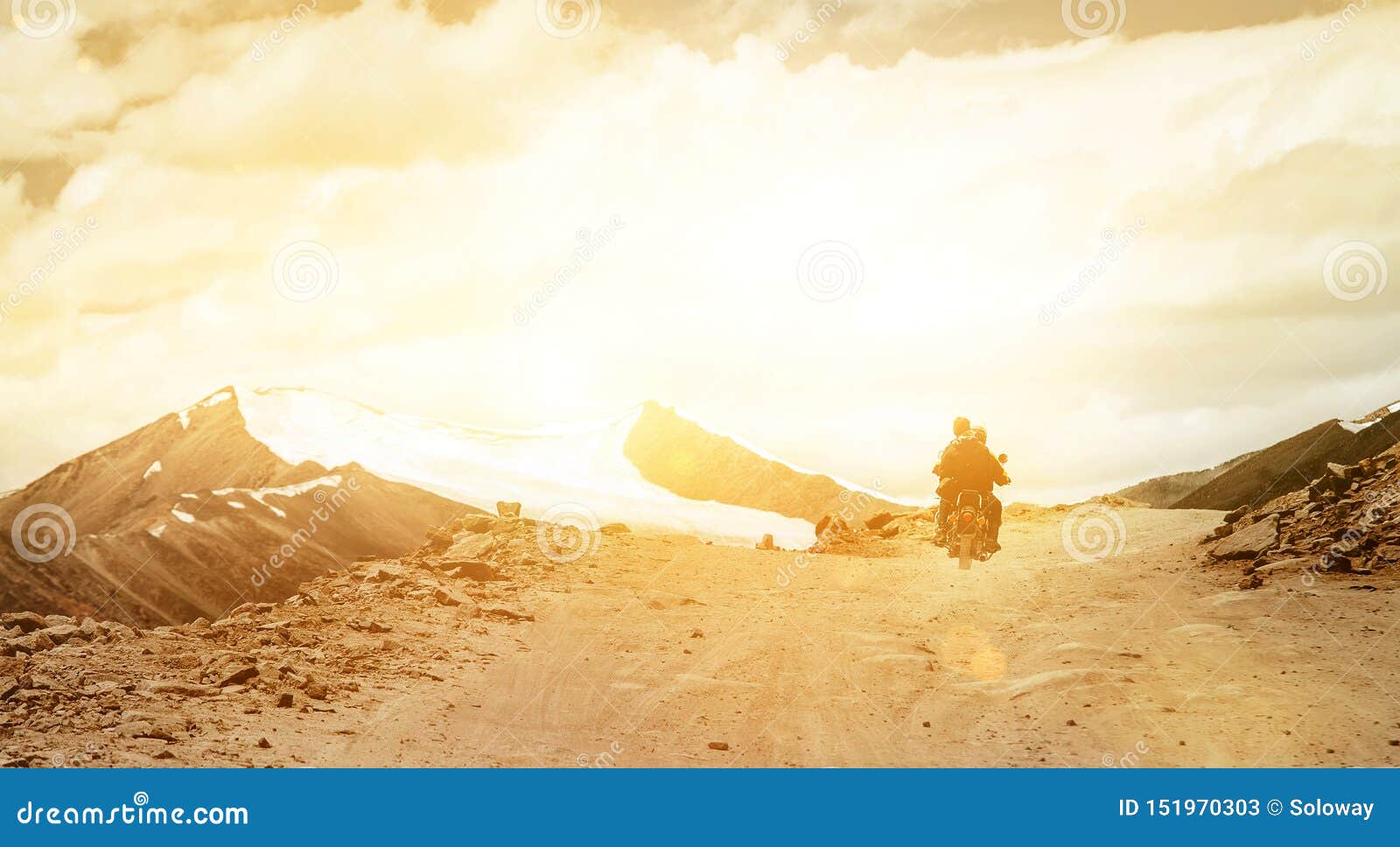 motobike travelers ride on mountain pass road in indian himalaya