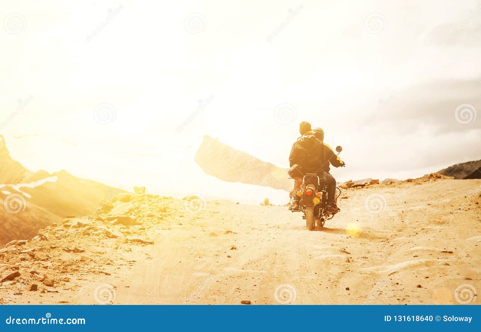 motobike travelers ride on mountain pass road in indian himalaya