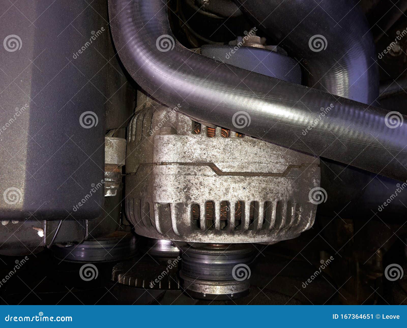 Motor Alternator in Engine Compartment, Together with Plastic Cover and