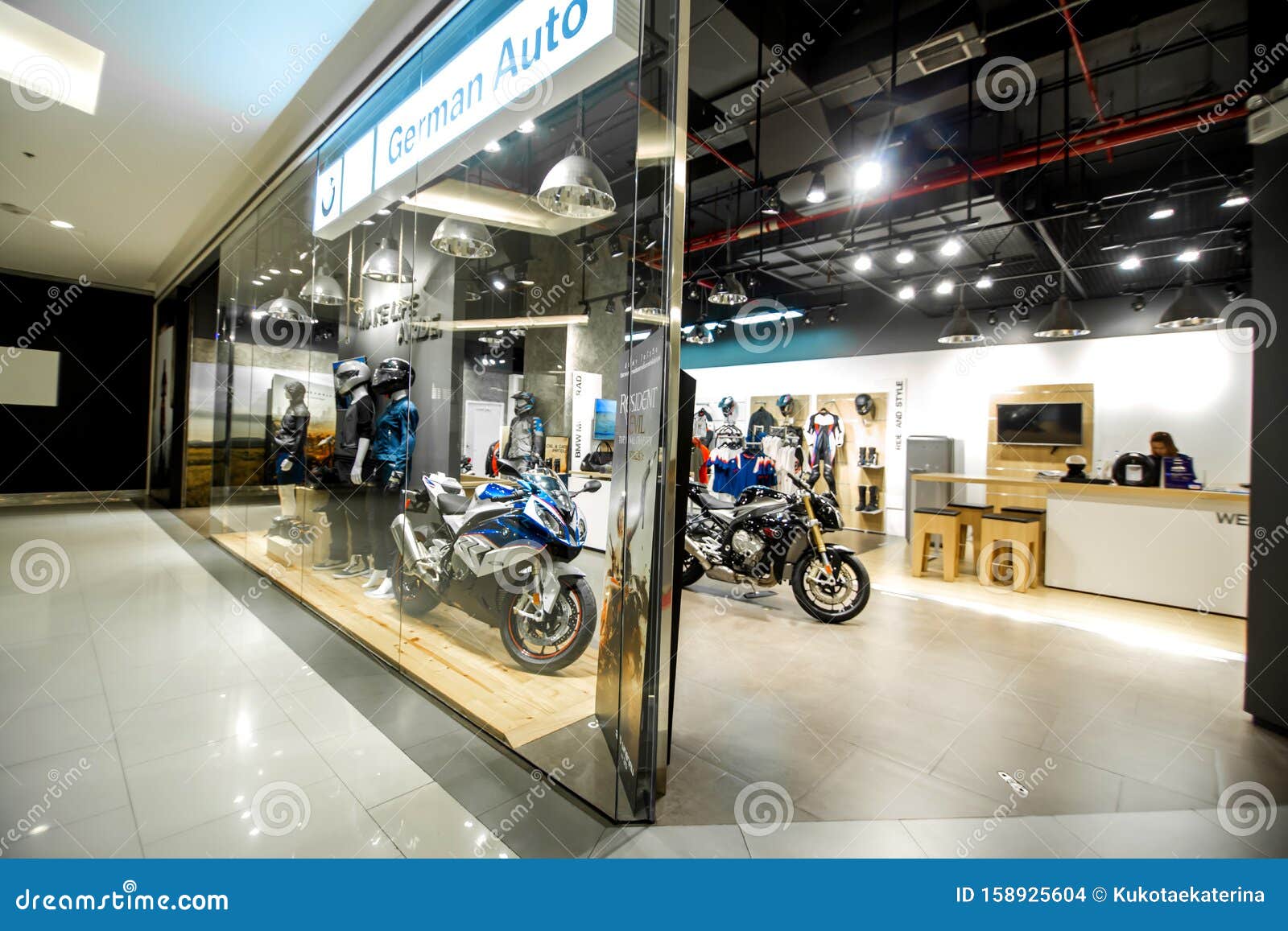 Motorcycle and Accessories Shop Inside the Mall. on the Window are