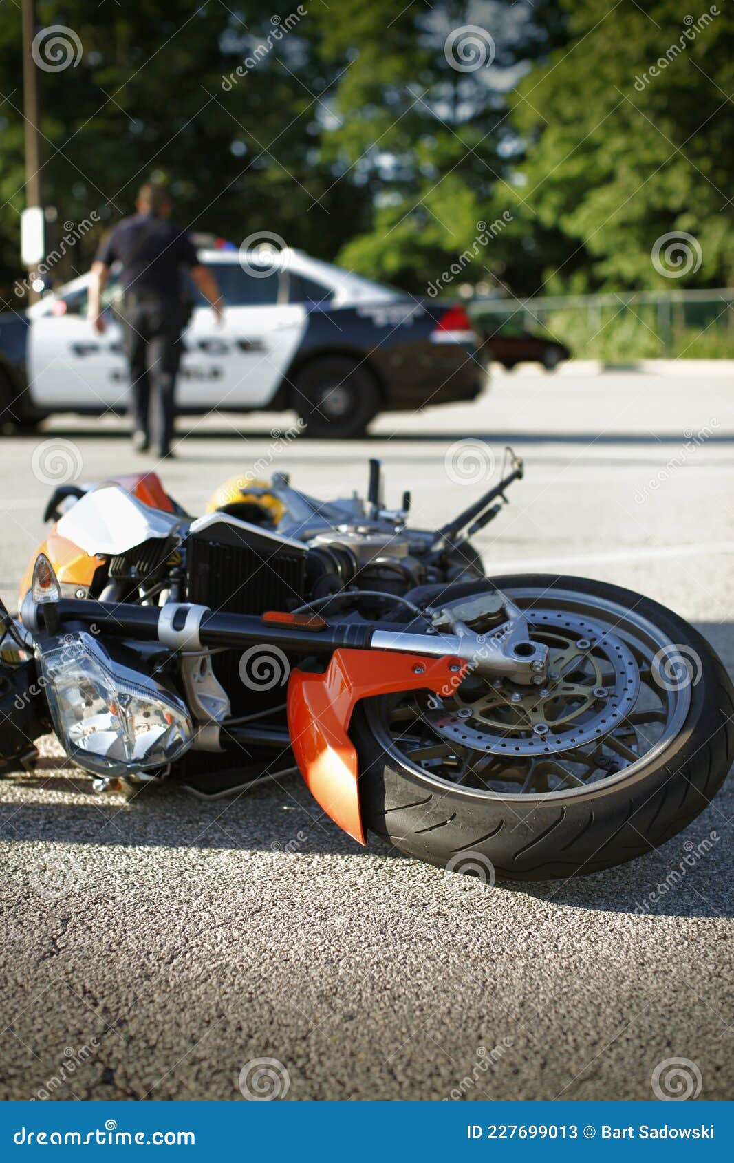 Motorcycle Accident Scene with Police Officer Walking To Squad Car Stock  Image - Image of physical, injury: 227699013