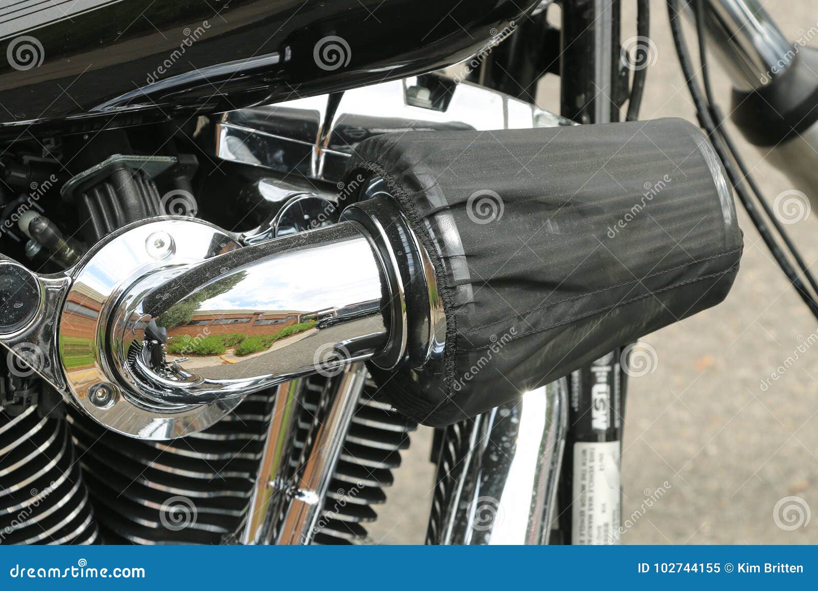 A Motorcycle Air Filter Pod With Cover