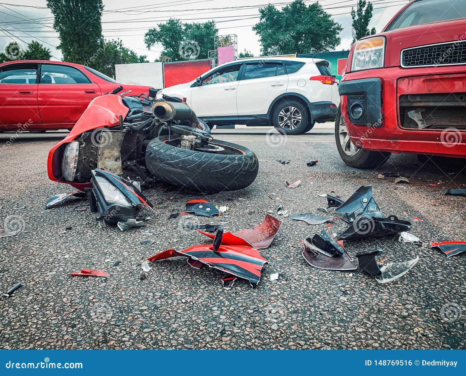 Motorcycle Bike Accident and Car Crash, Broken and Wrecked Moto on Road