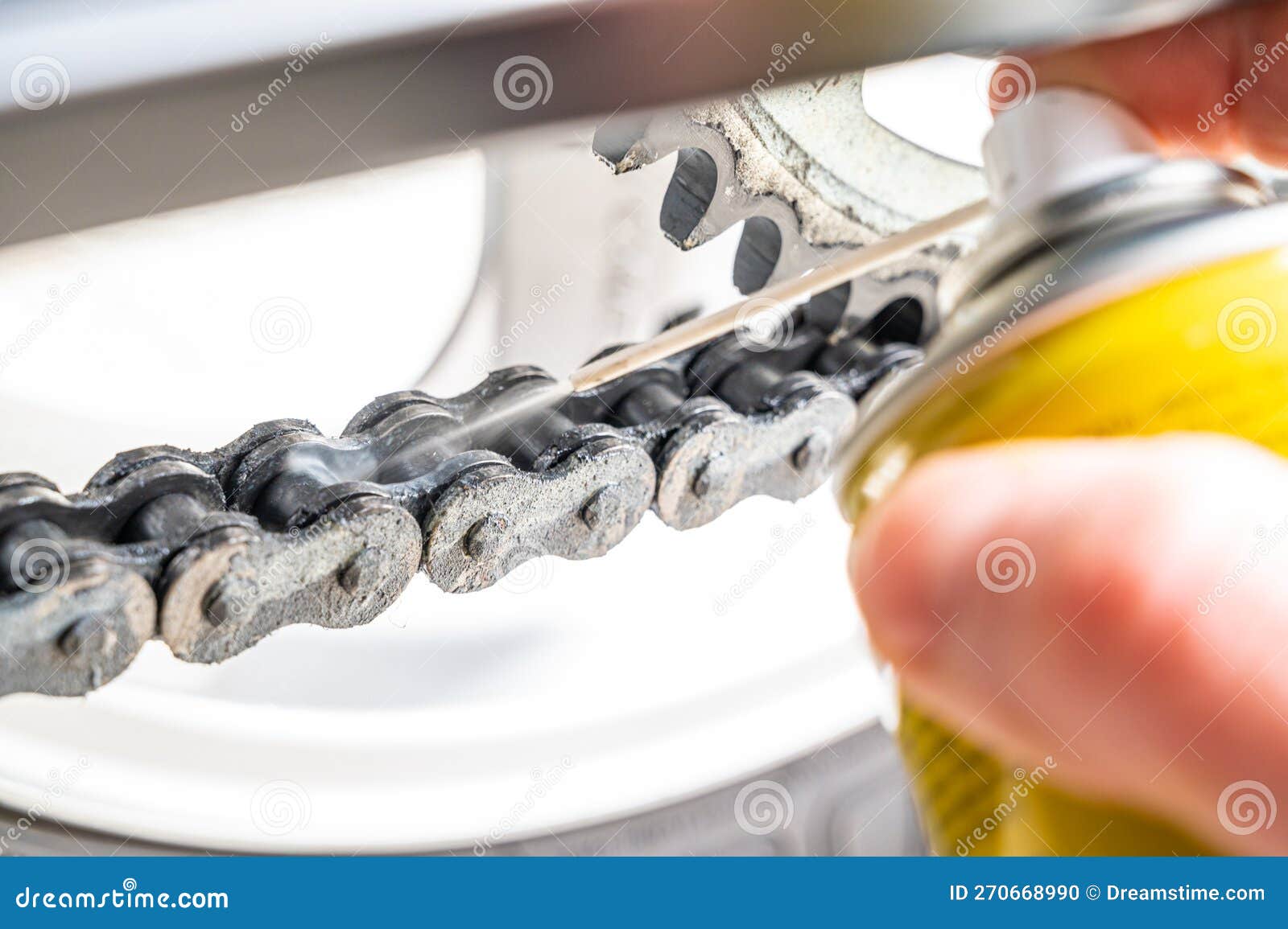 Motorcycle Drive Chain and Lubricant. Stock Photo Image of