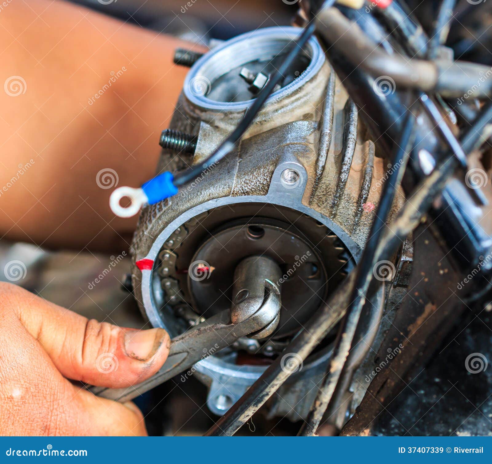 Motorcycle fixing stock image. Image of people, motorcycling 37407339