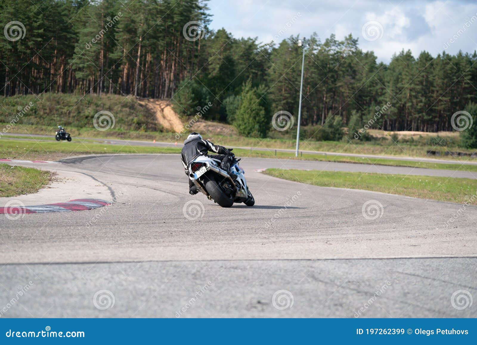 Motorcycle Practice Leaning into a Fast Corner on Track Editorial Stock