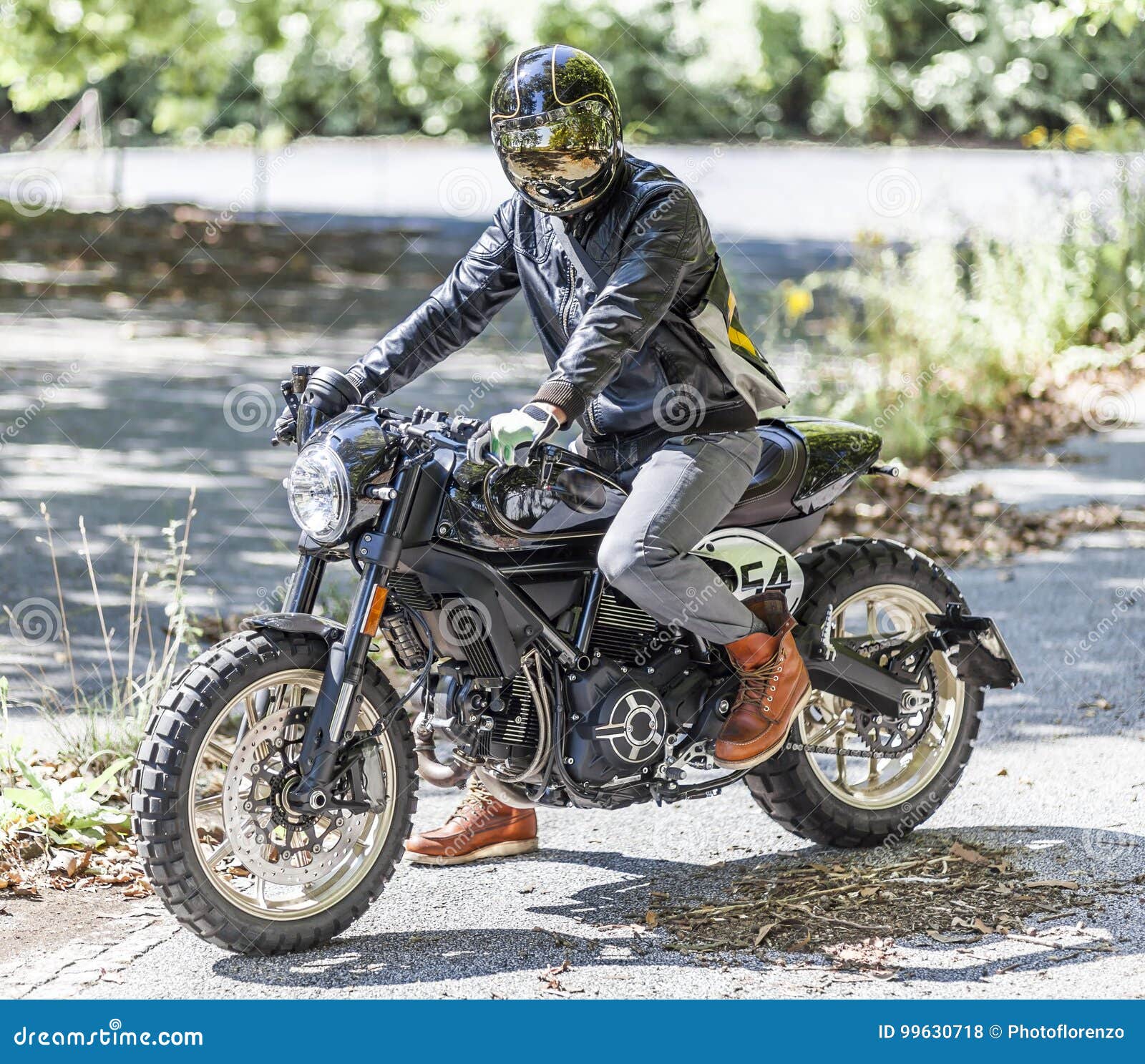Motorcycle Rider On Custom Made Scrambler Style Cafe Racer In Th Stock  Photo - Image Of Helmet, Lifestyle: 99630718