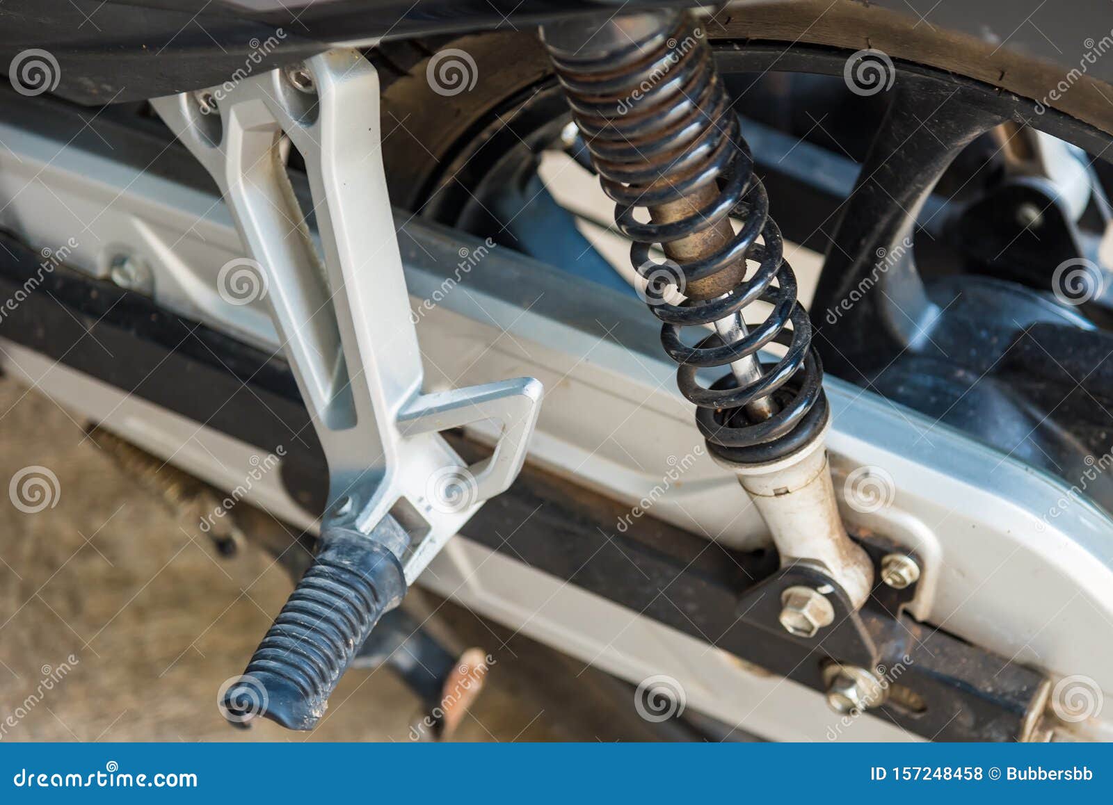 Motorcycle Shock Absorber Spring, through the Use of Longer Stock Photo