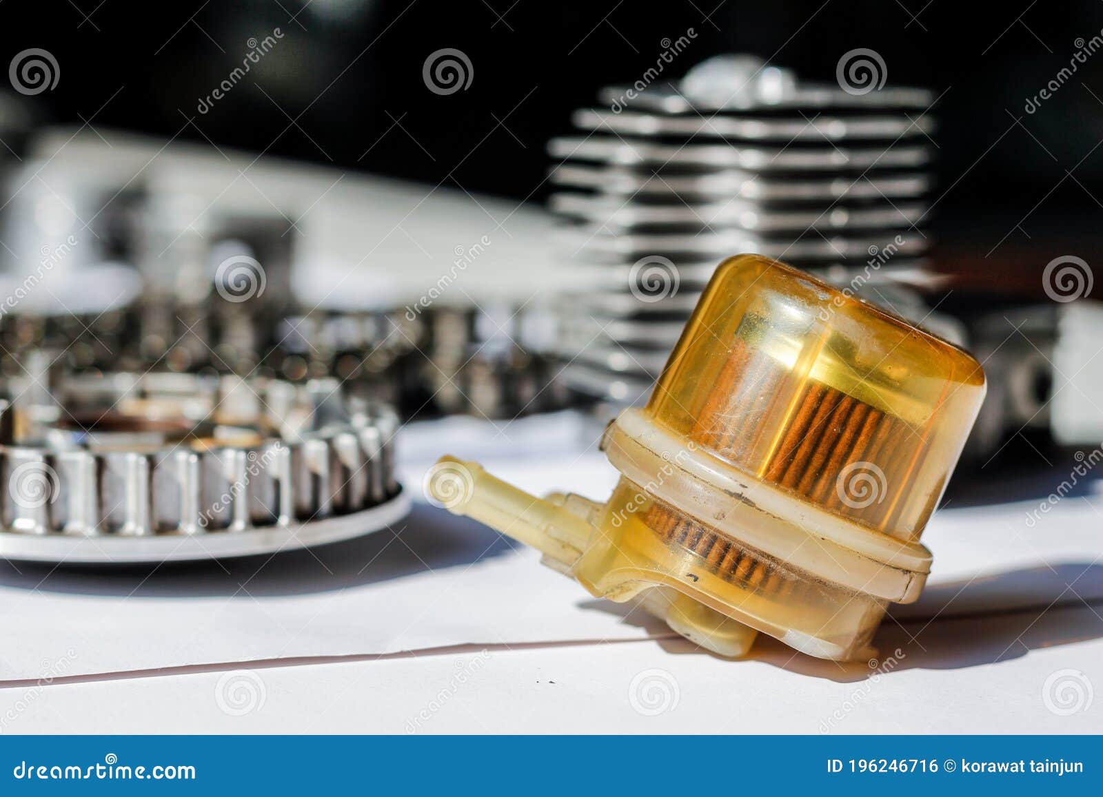 Motorcycle Spare Parts are Placed on a White Table To Study and Design