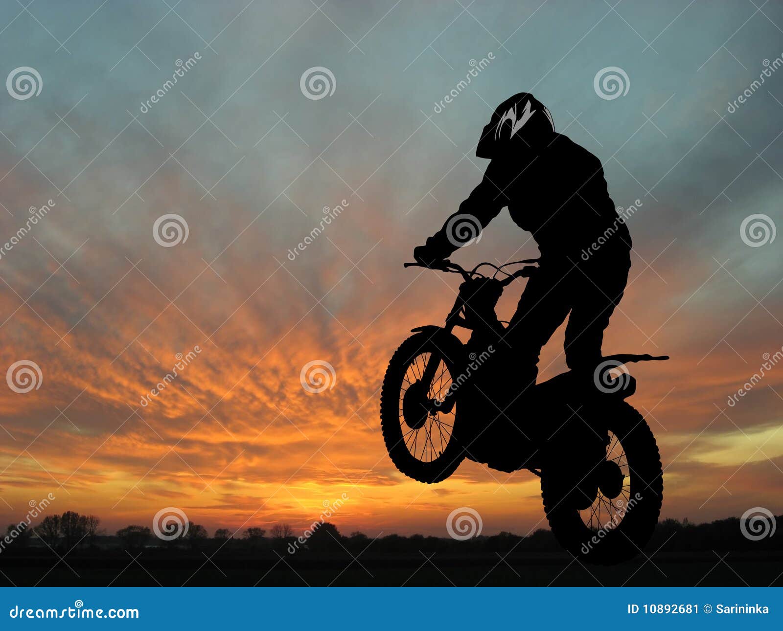 motorcyclist in sunset