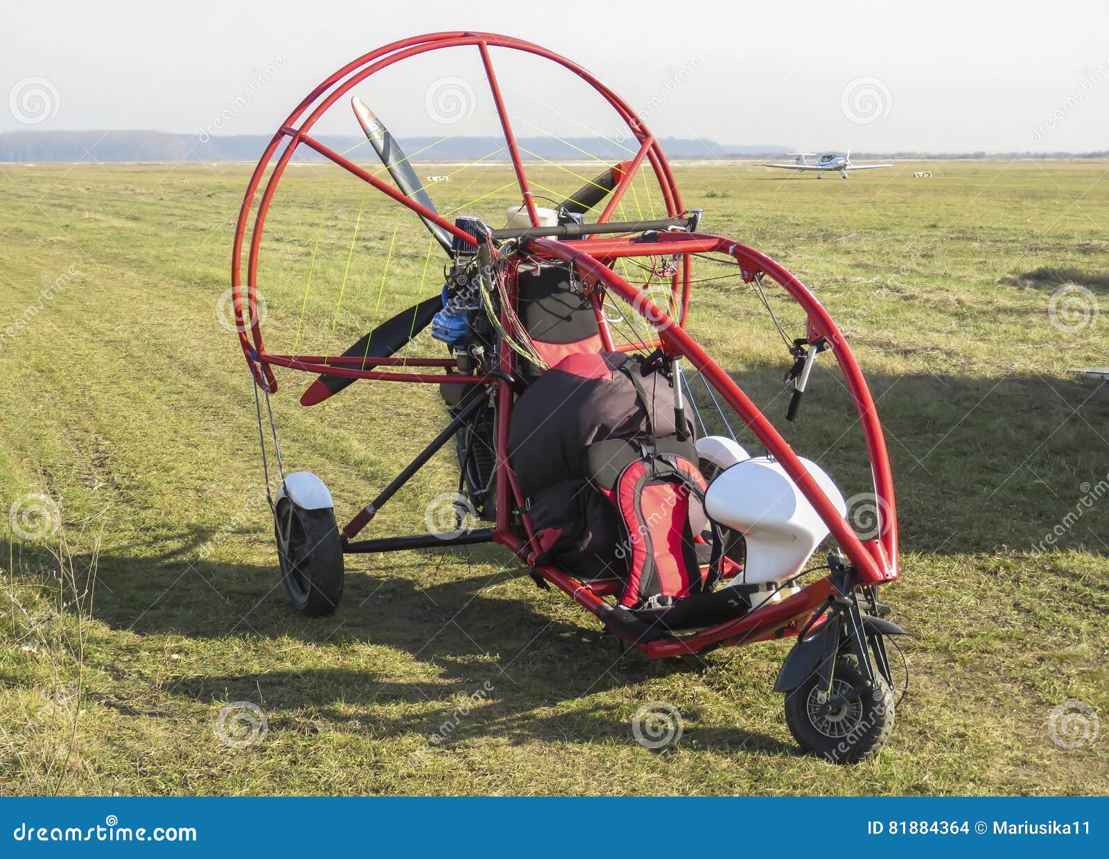 motorized paraglider on airfield
