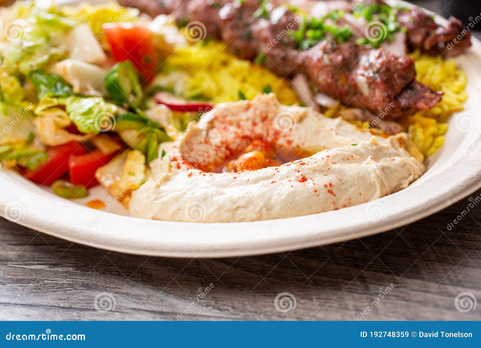 Mound of hummus stock image. Image of food, text, store 192748359