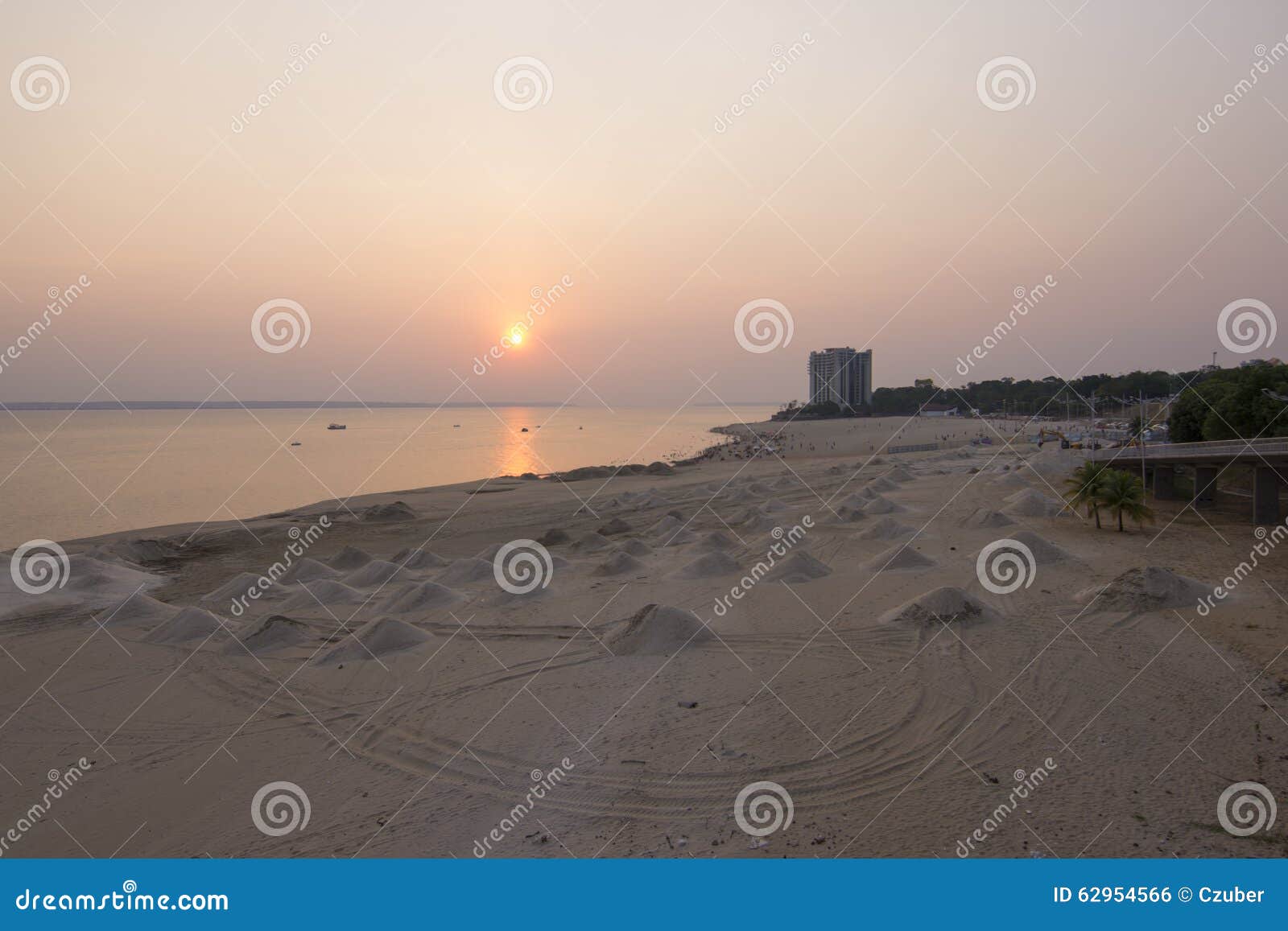 mounds of beach sand on rio negro