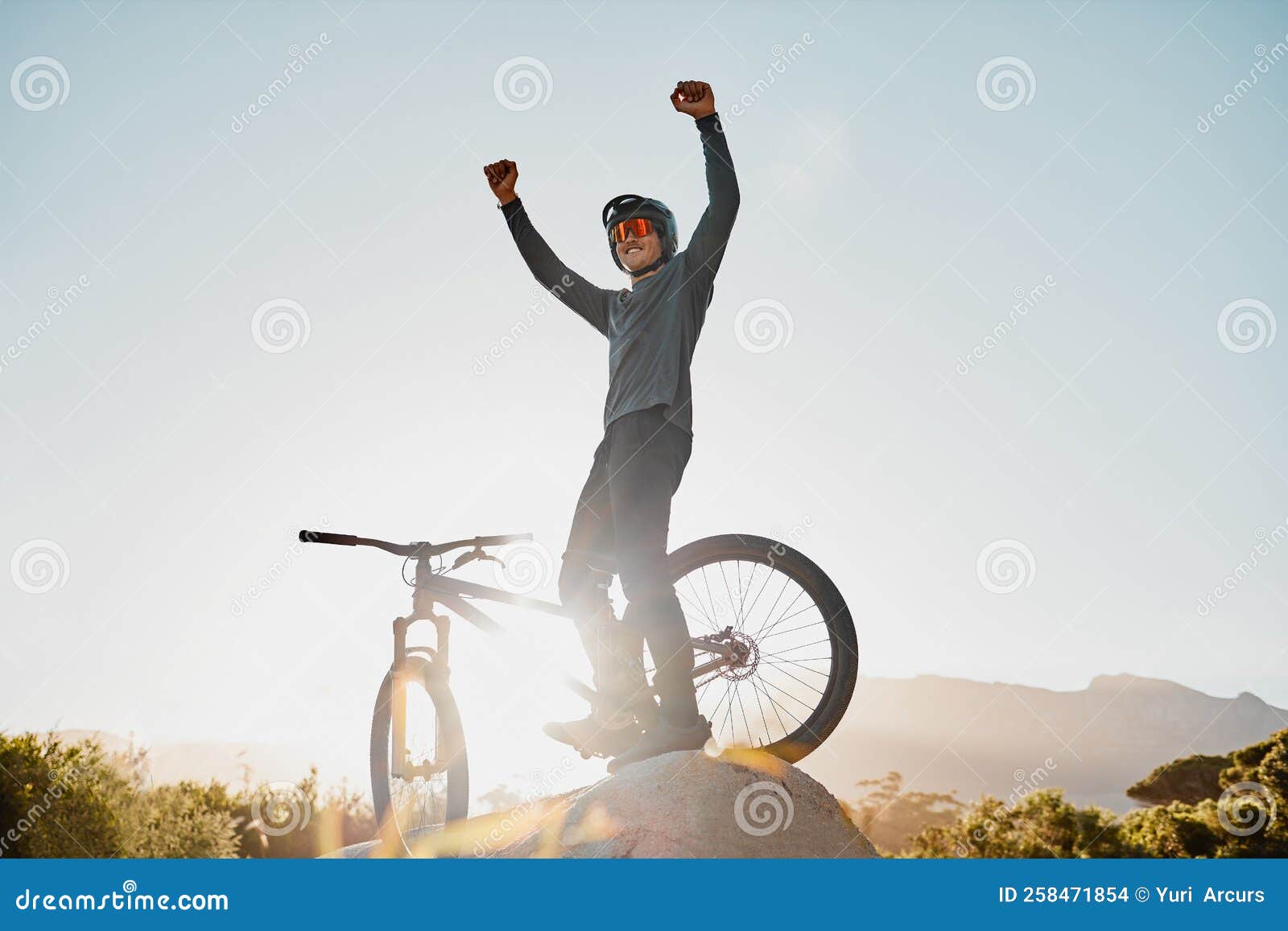 Mountain Bike Winner or Motorcycle Man with Success, Yes or Fist Pump