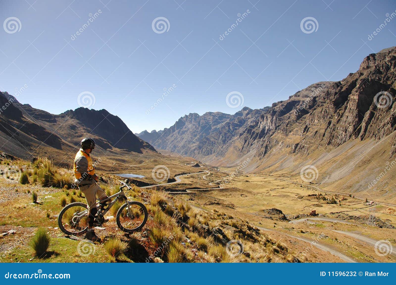mountain biker looking at valley