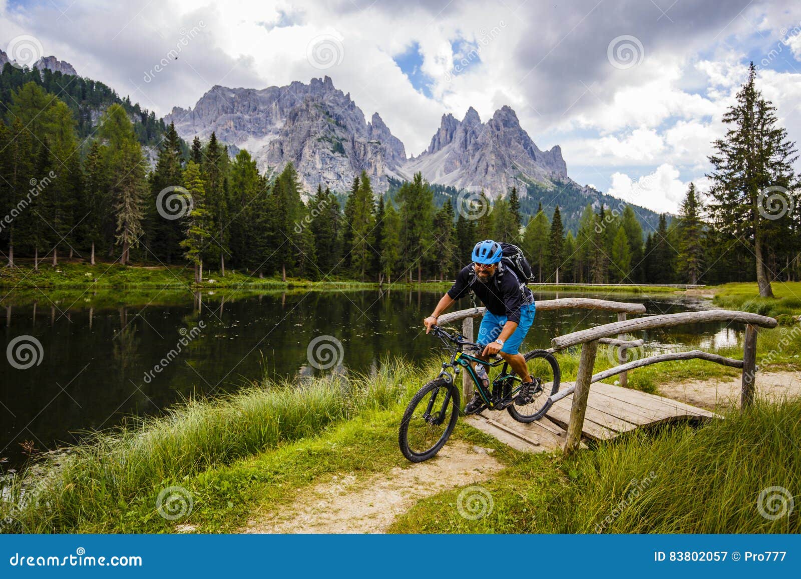 mountain biking in the dolomites, misurina, italy. tre cime di l