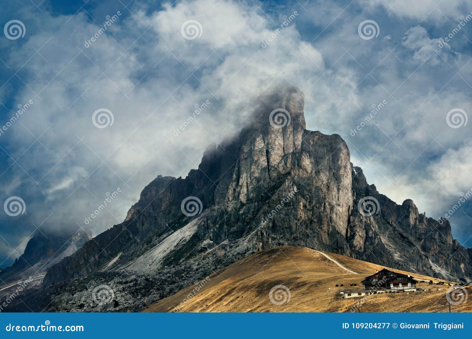 mountain dramatic landscape. passo giau, dolomites italy. desaturated