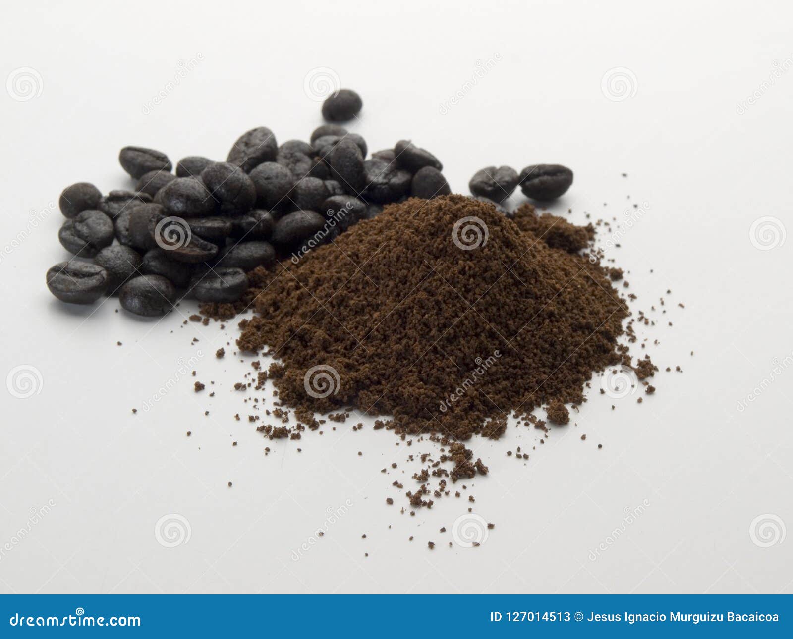mountain in the foreground of ground coffee and loose grains 2