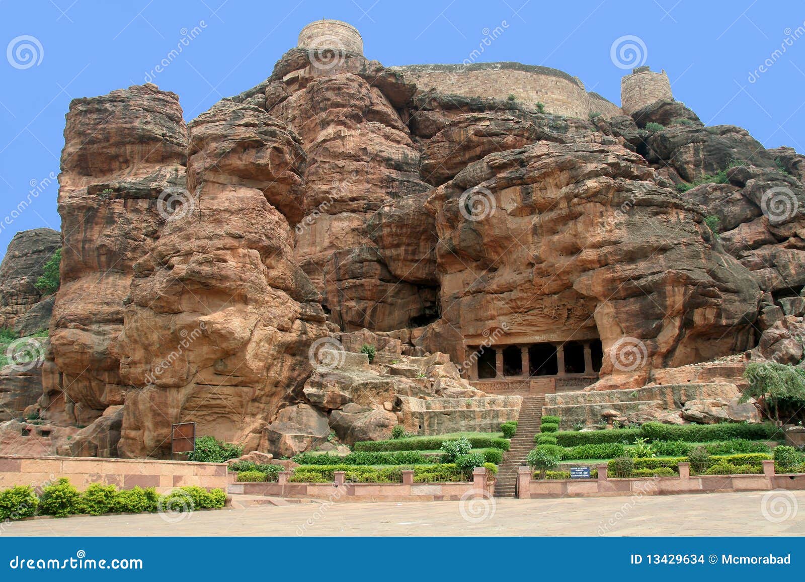 Mountain, Fort and Cave. Fort atop rocky mountain and first cave temple at Badami, Karnataka, India, Asia