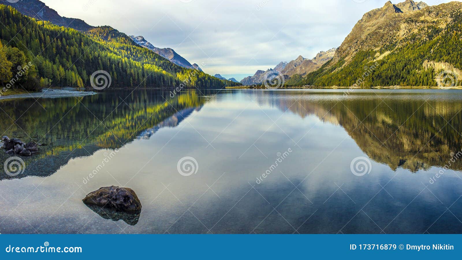 mountain lake panorama with mountains reflection. idyllic look. autumn forest. silvaplana lake,