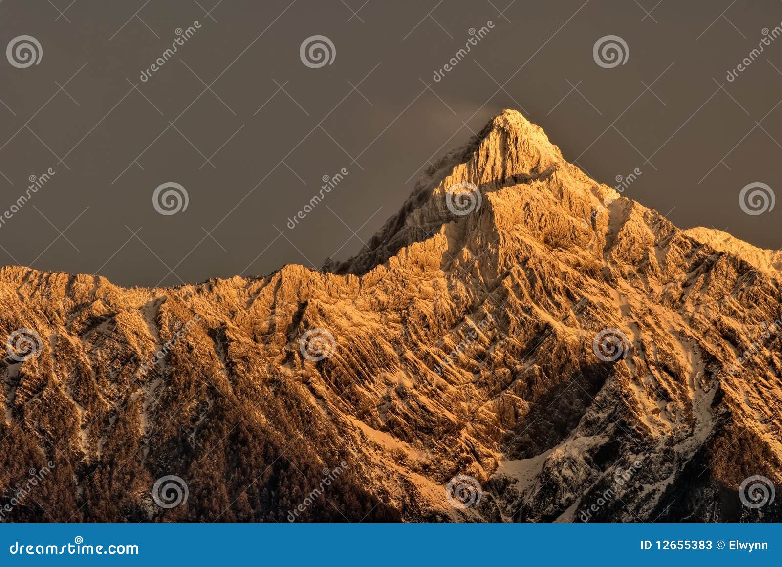 Mountain Peak Peeking From Clouds. Cloud Clearing Exposing Epic Indian
