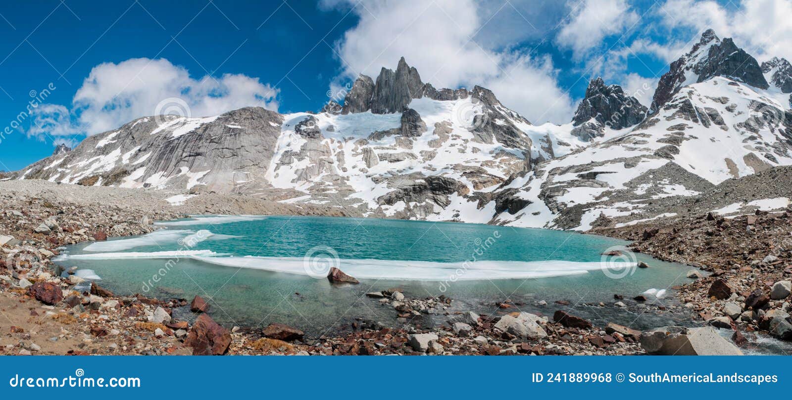 panorama of lake and mountain peaks torres del avellano in patagonia, chile