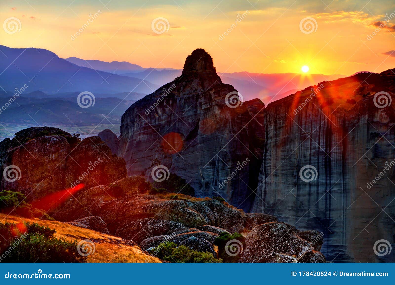 mountain range in the rays of sunrise.