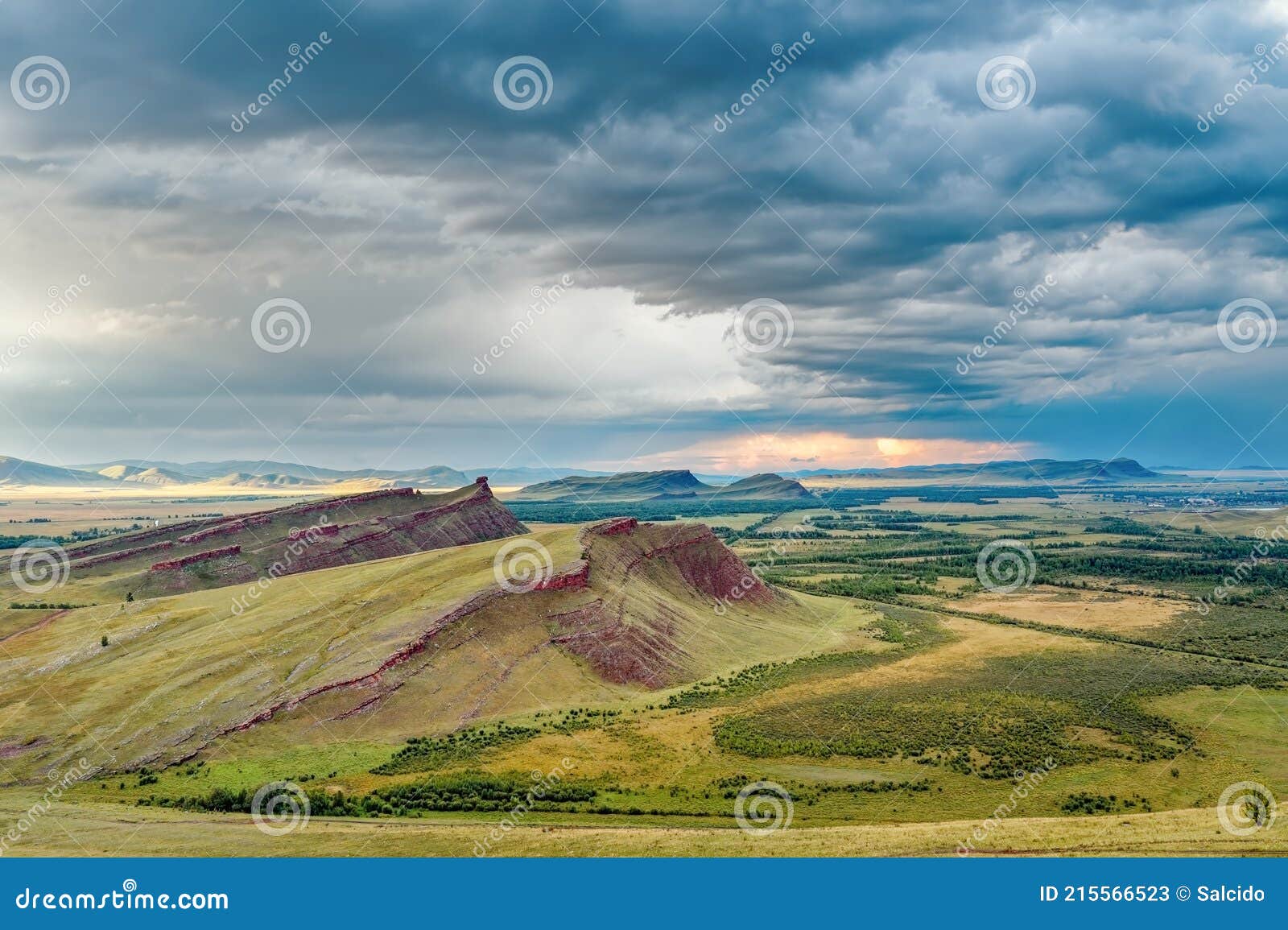 mountain range sunduki chests under a cloudy vespers sky light on the horizon silence fancy red stones