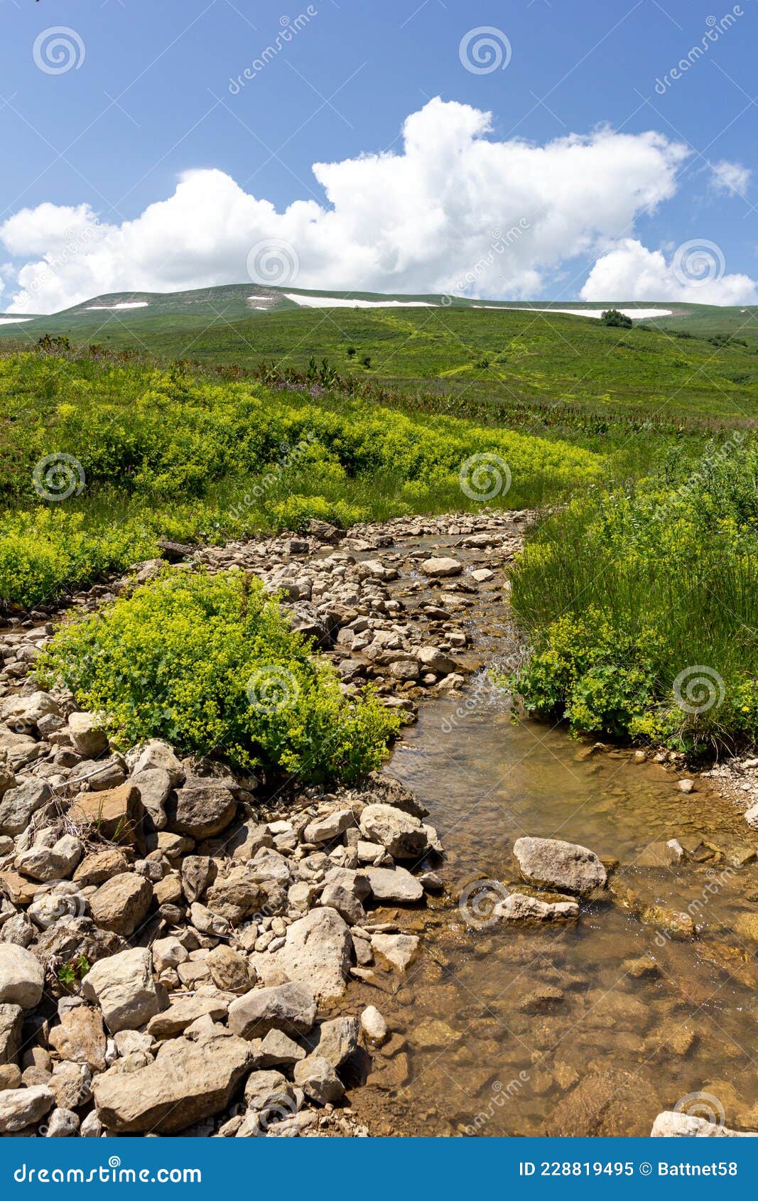 areas of mountainous terrain, summer, walking along the canyon of a mountain river on a sunny day,impassable places for tourism.