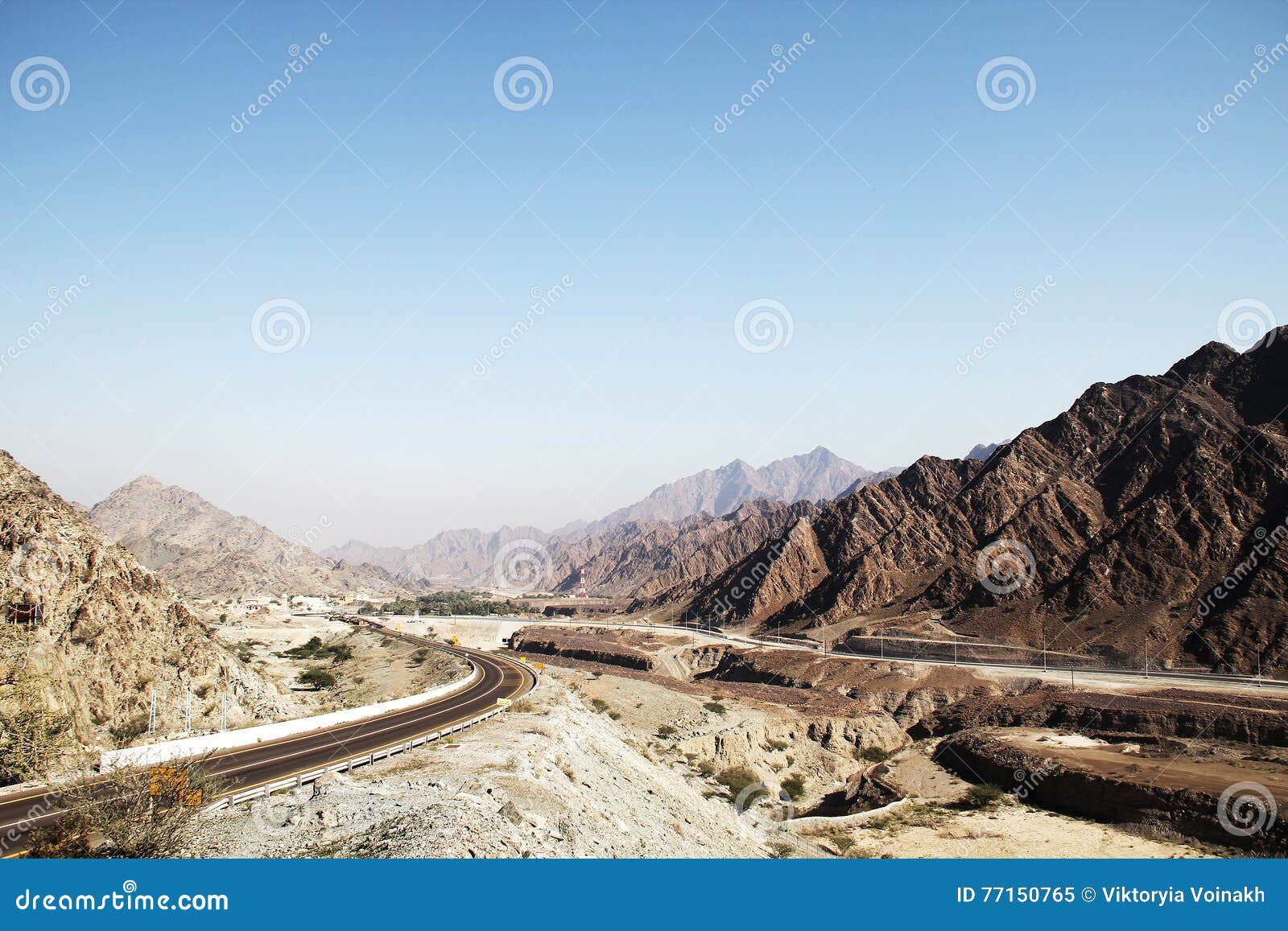 Mountain road in UAE with blue sky