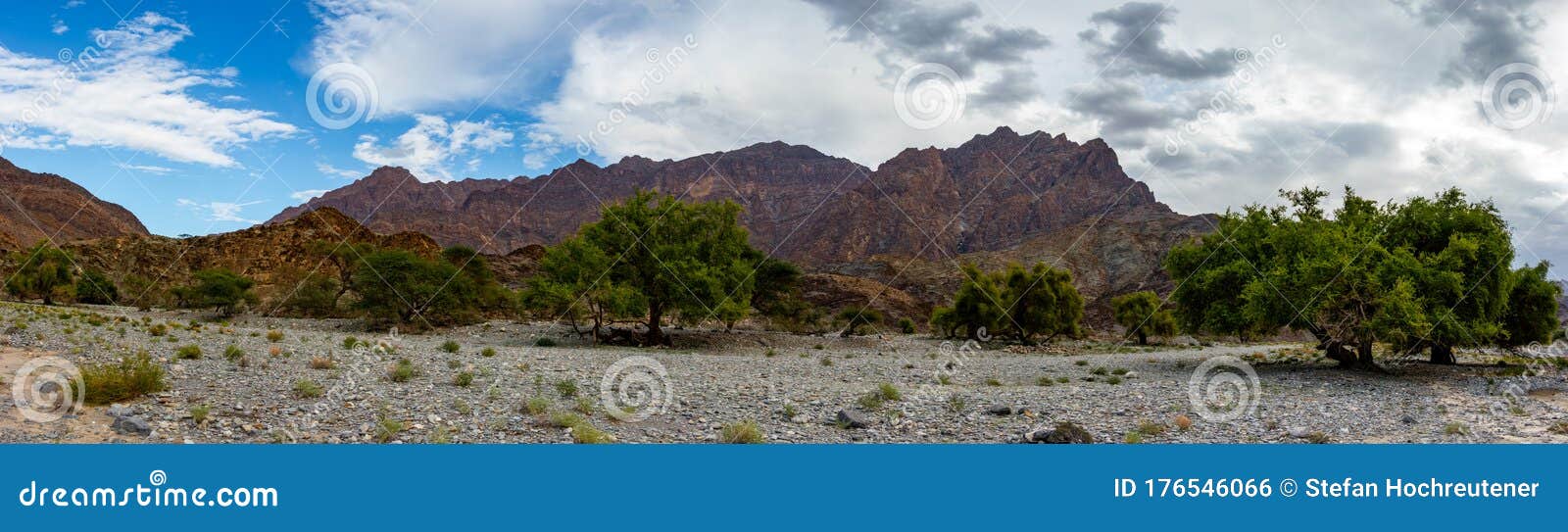 mountain and valley view along wadi sahtan road and snake canyon in al hajir mountains between nizwa and mascat in oman