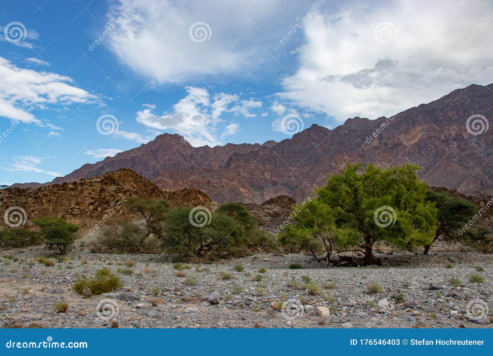 mountain and valley view along wadi sahtan road and snake canyon in al hajir mountains between nizwa and mascat in oman