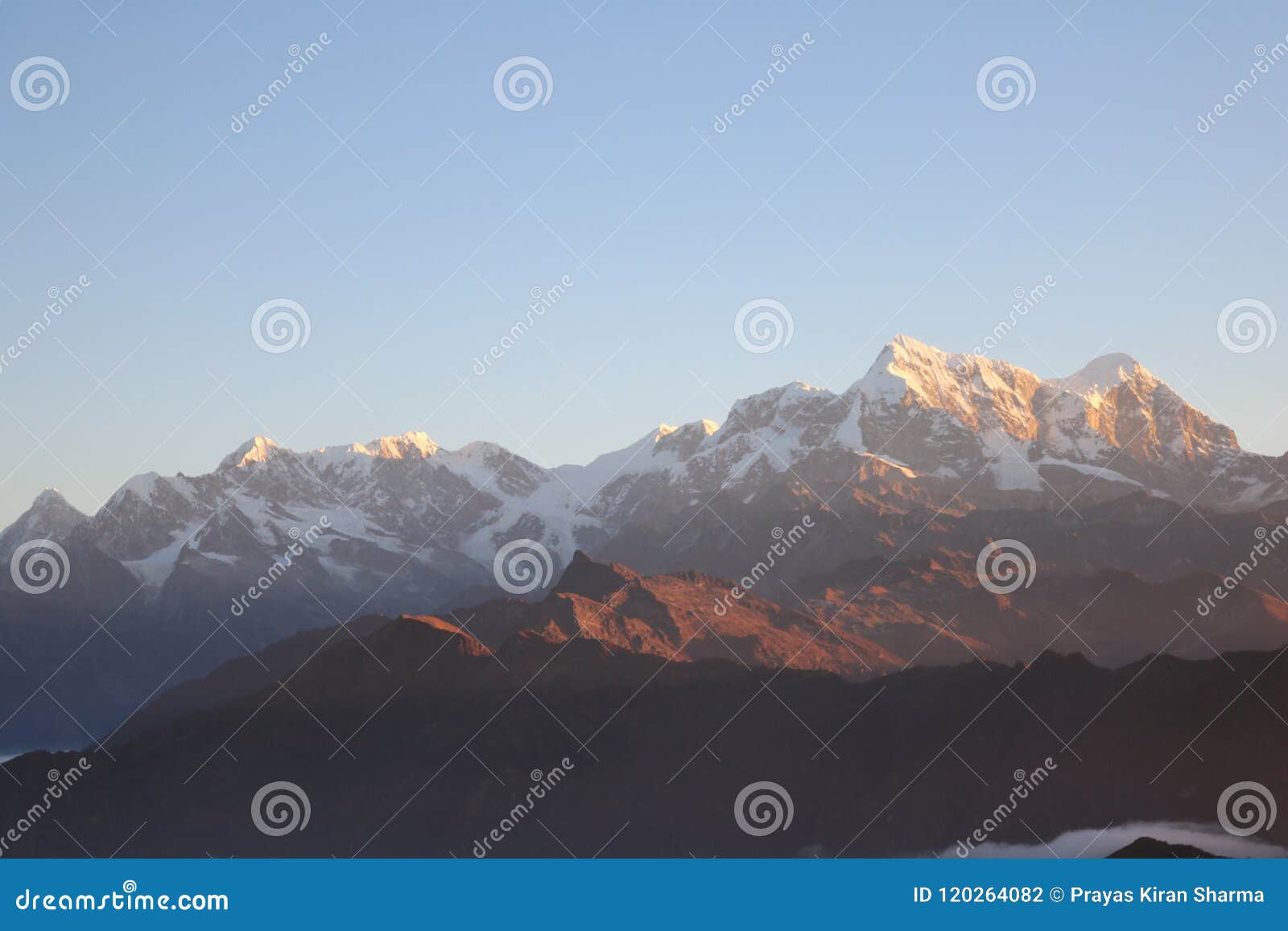 panoramic snow covered mountain view from mountain flight