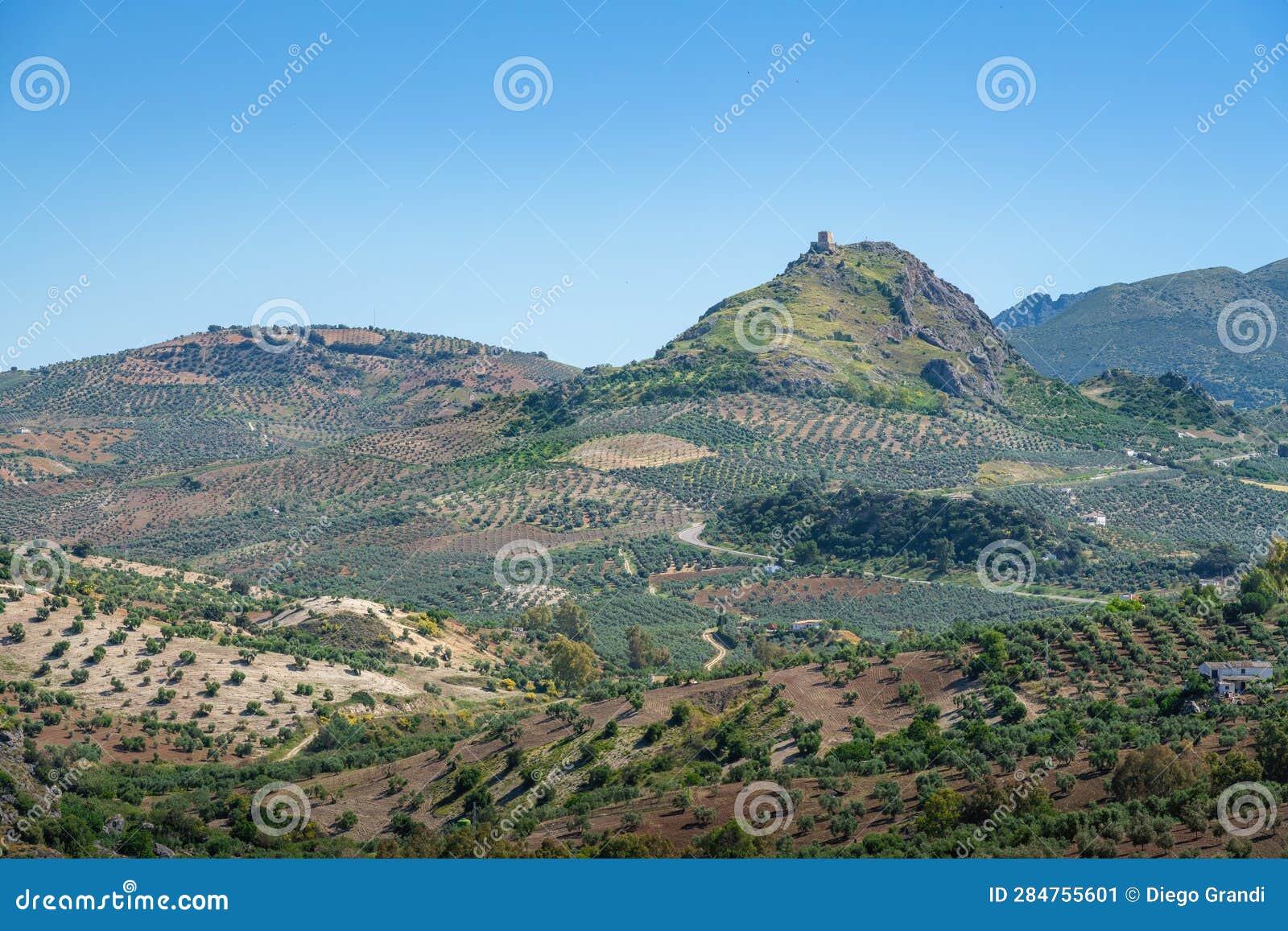 mountains view from olvera with the iron castle of pruna - olvera, andalusia, spain