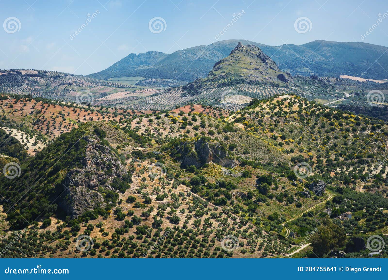 mountains view from olvera with the iron castle of pruna - olvera, andalusia, spain
