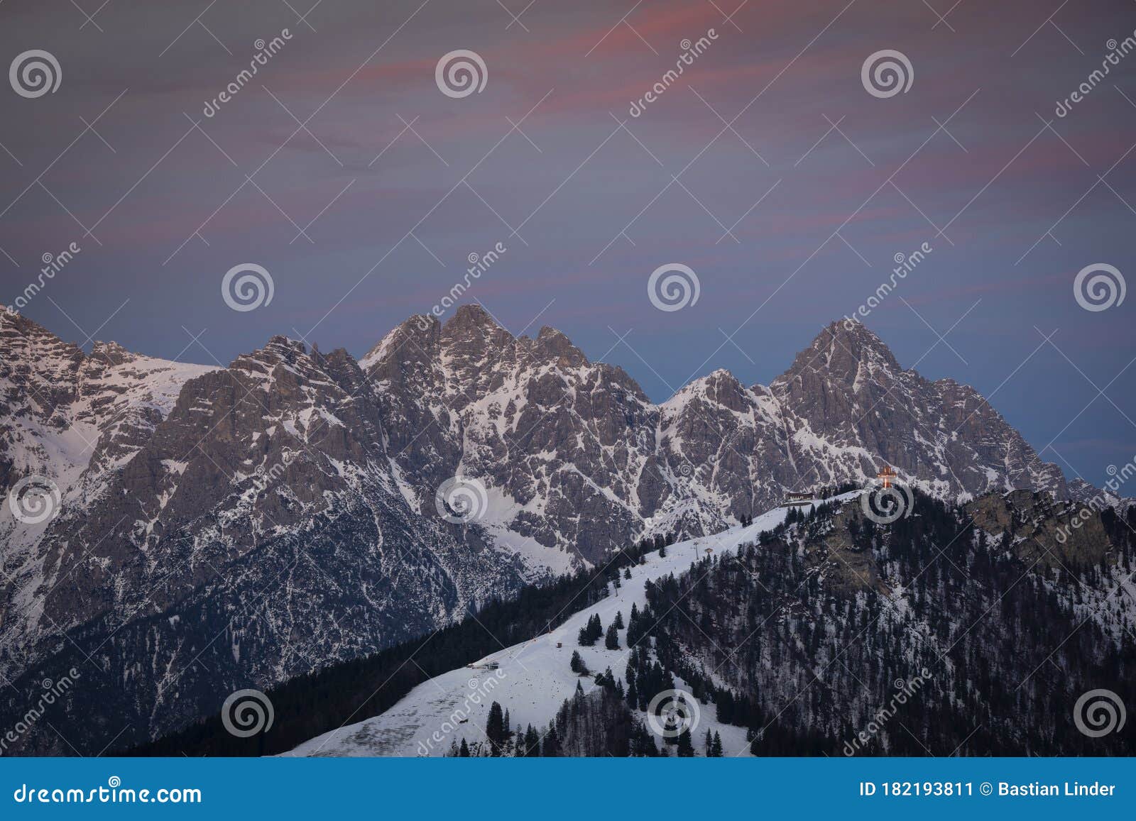 mountains of wilder kaiser at fieberbrunn during sunset in winter with snow, tyrol austria