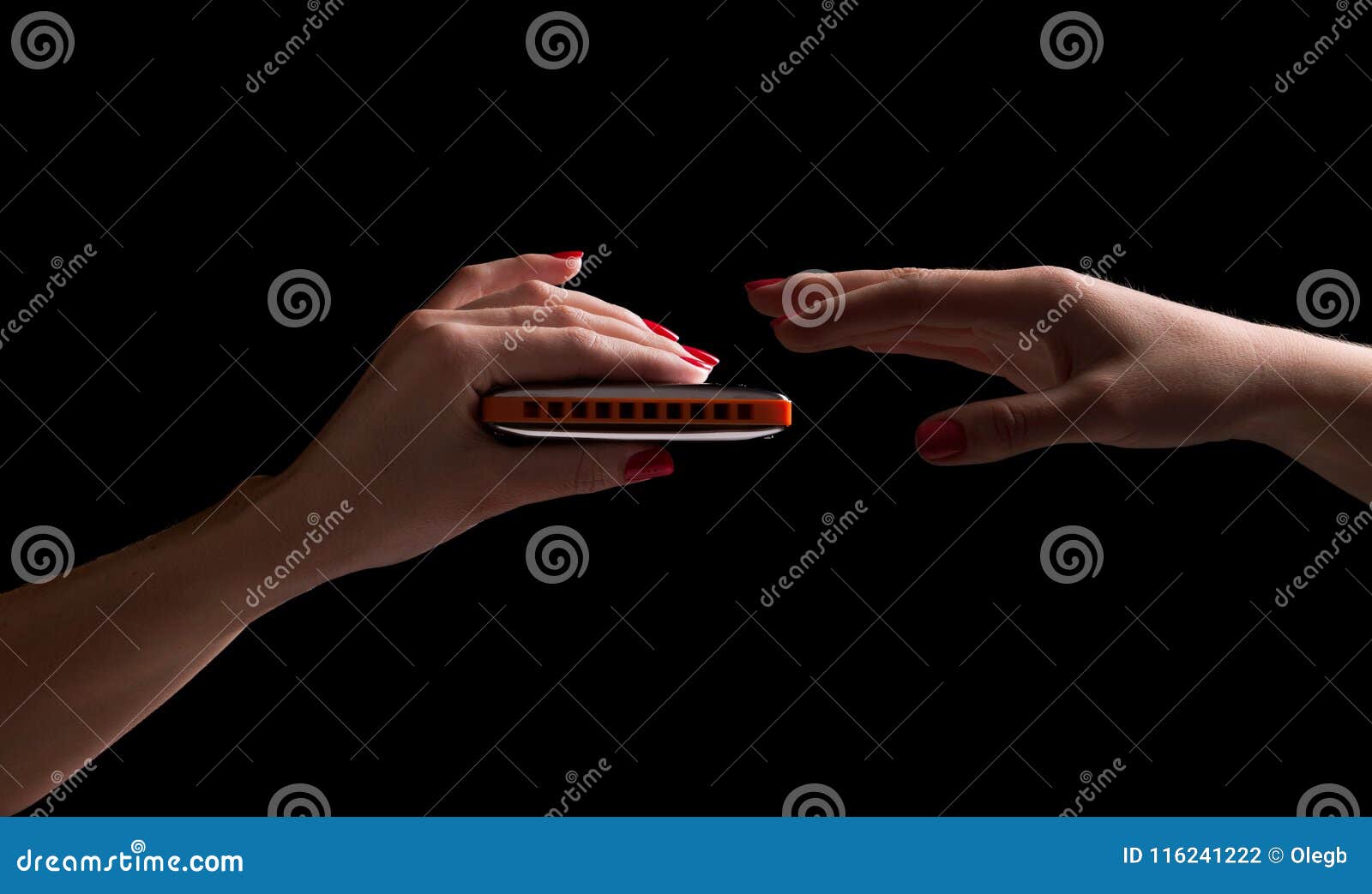 Mouth Harmonica Country Blues on a Black Background. Stock Photo