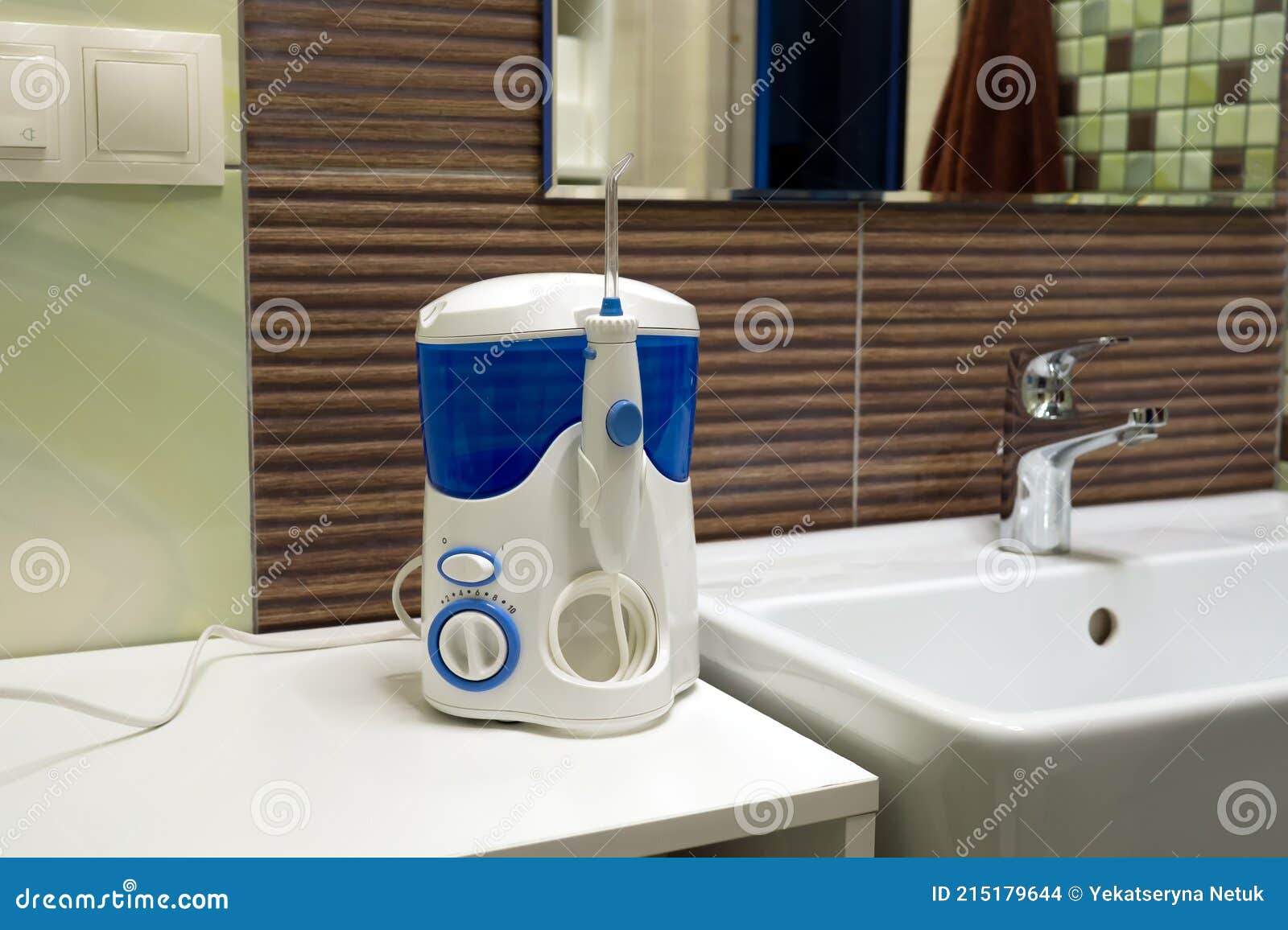 Mouth Teeth Cleaning Irrigator Modern Tool in Bathroom. Oral Hygiene, Bathroom Objects Concept