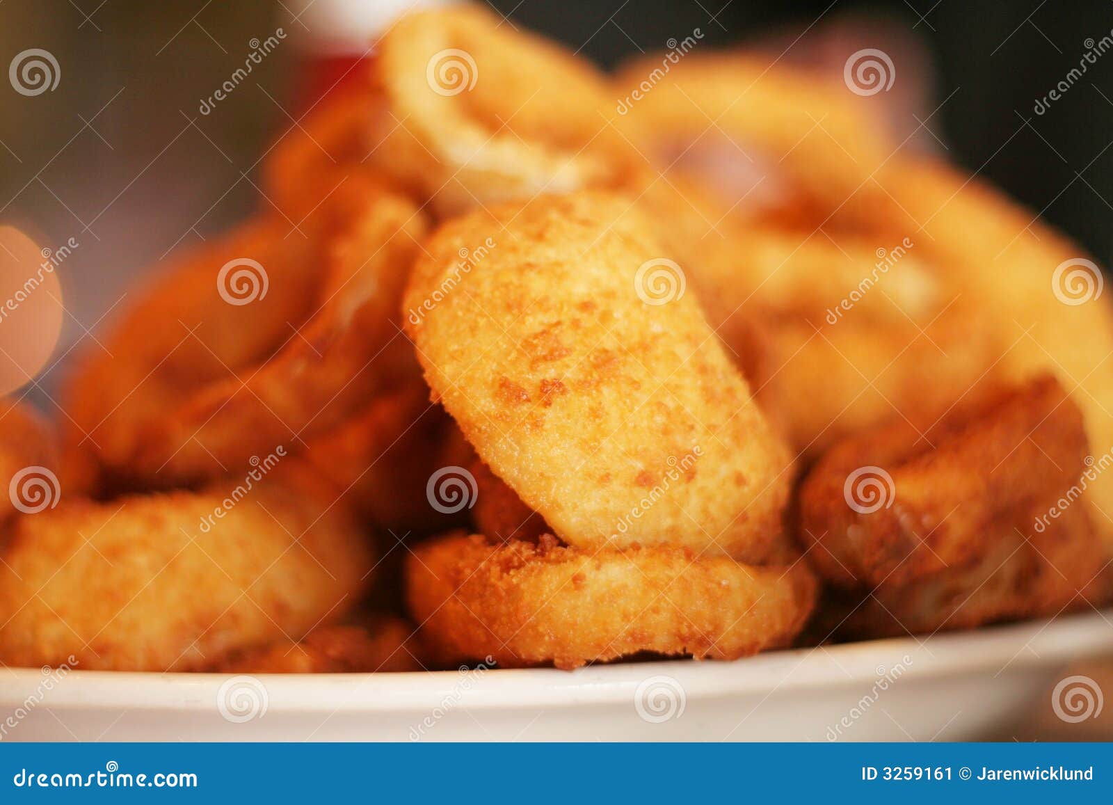 Mouth watering onion rings stock image. Image of meal 3259161