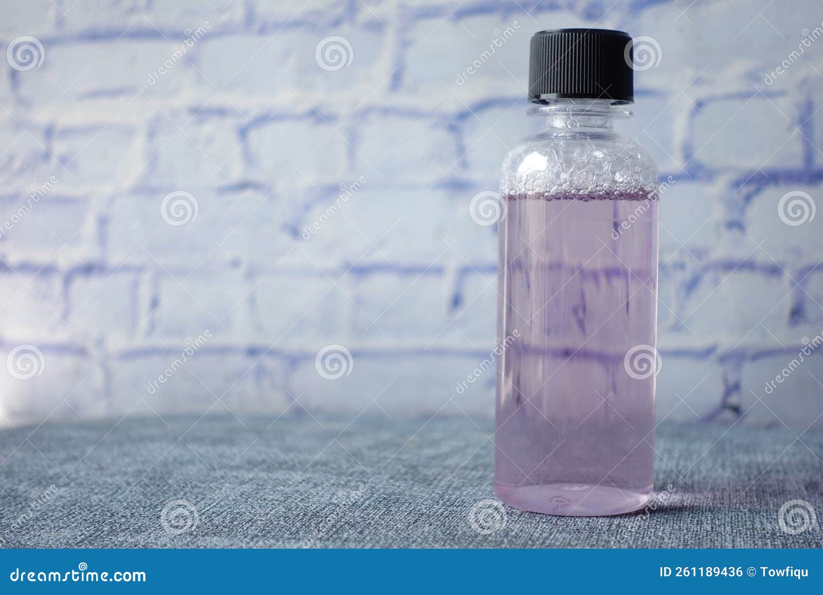 Mouthwash Liquid in a Container on Table Stock Photo Image of product