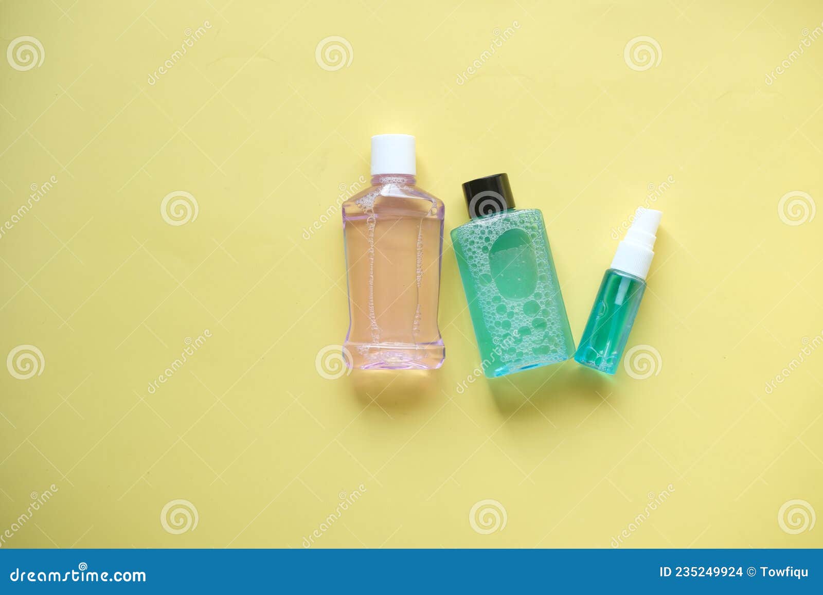 Mouthwash Liquid in a Container on Yelow Background Stock Photo Image