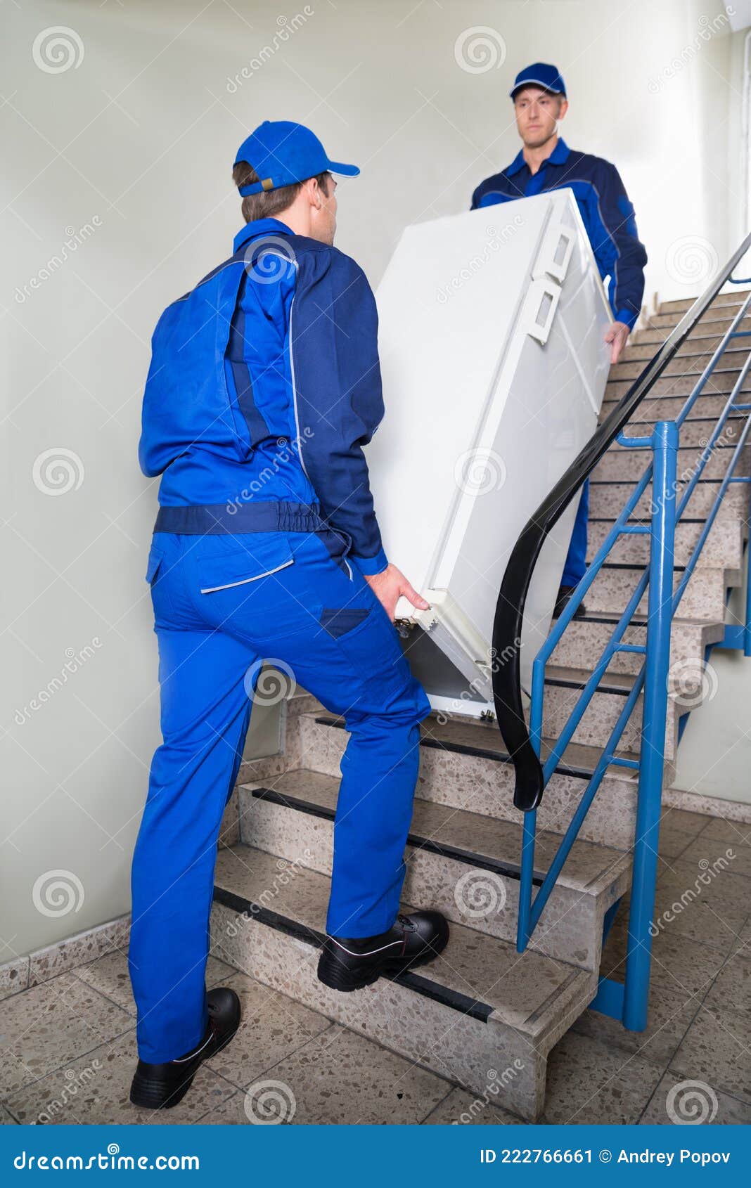 Movers Carrying Refrigerator on Steps at Home Stock Image Image of