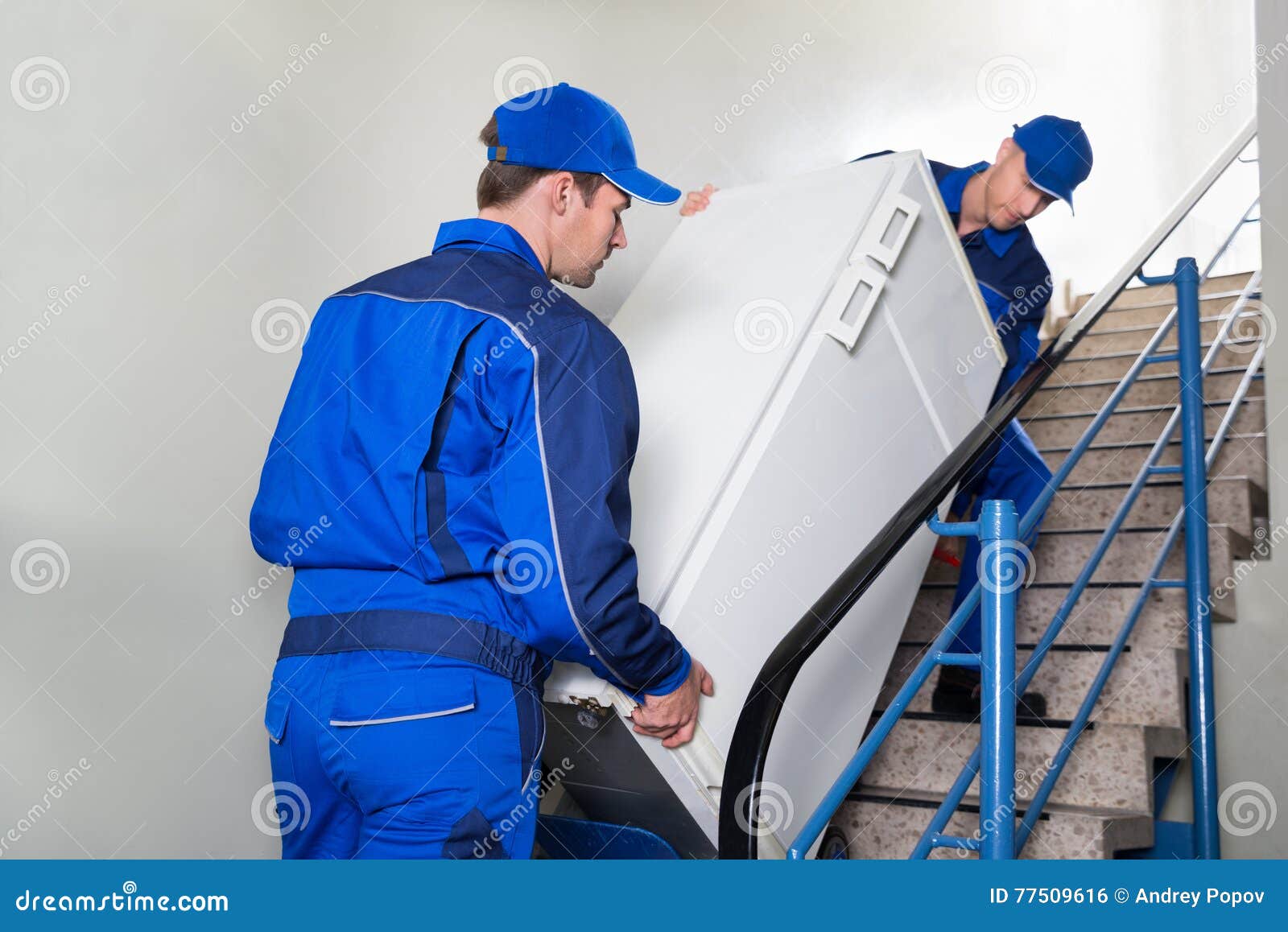 Movers Carrying Refrigerator on Steps Stock Photo Image of movers
