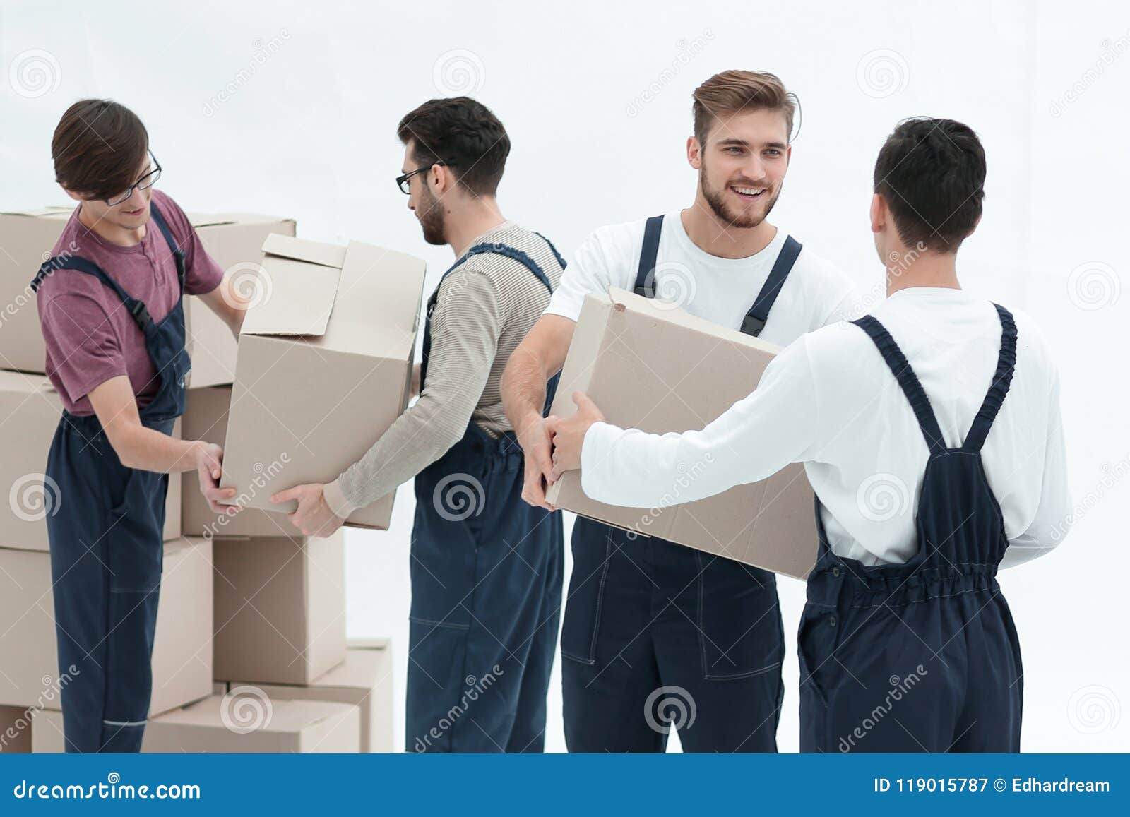 Movers Lifting Stack of Cardboard Moving Boxes Isolated on White Stock