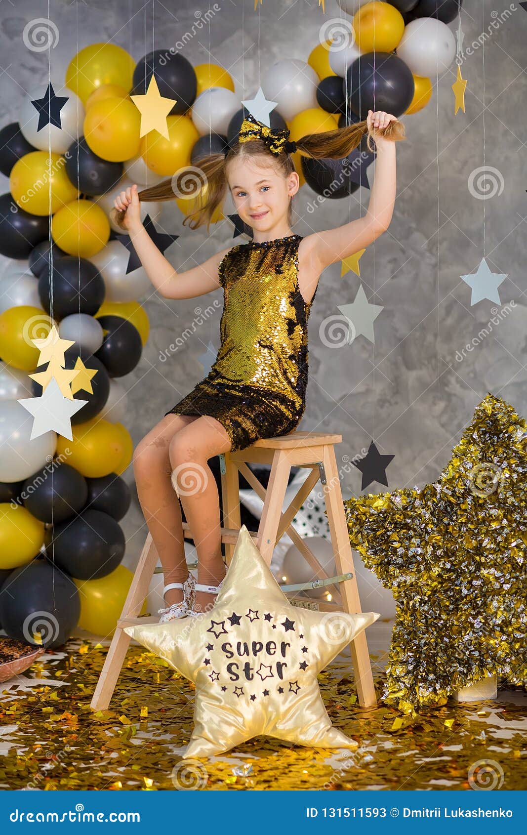 Movie Super Star Girl Model Posing In Studio Shoot With Golden Star And Colorful Baloons Wearing Stylish Gold Airy Dress With Stock Image Image Of Fashion Dress