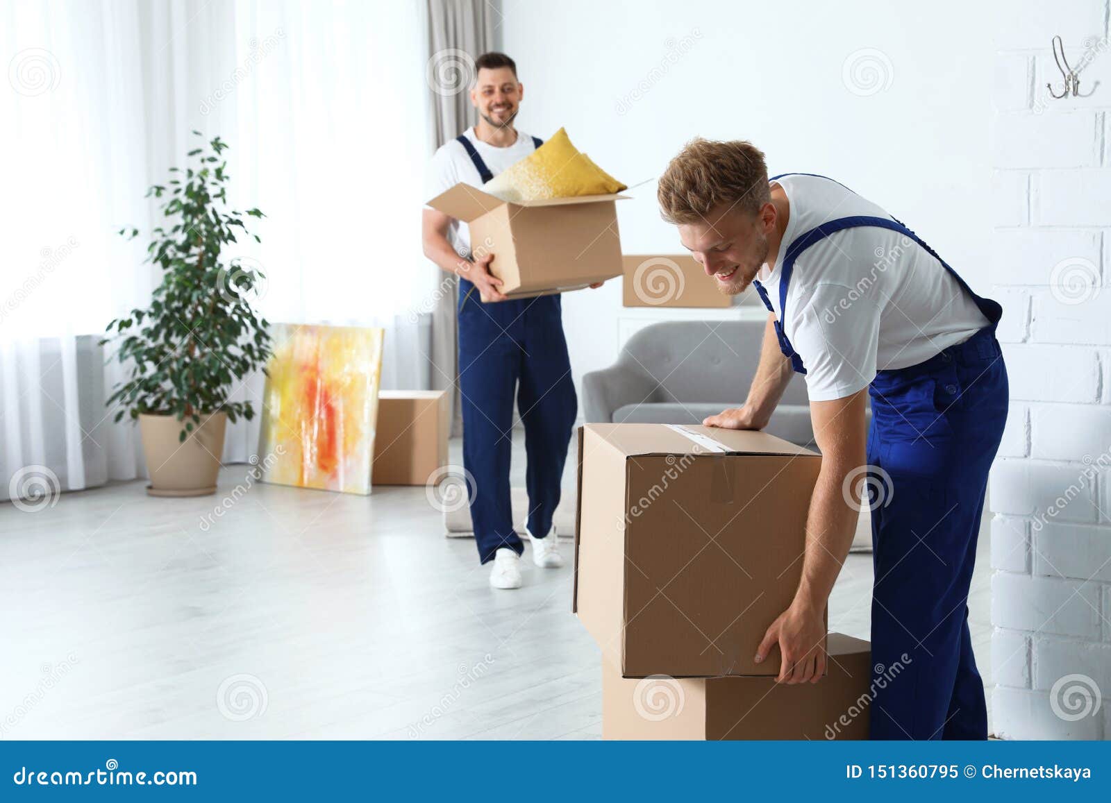 Moving Service Employees with Cardboard Boxes Stock Image Image of