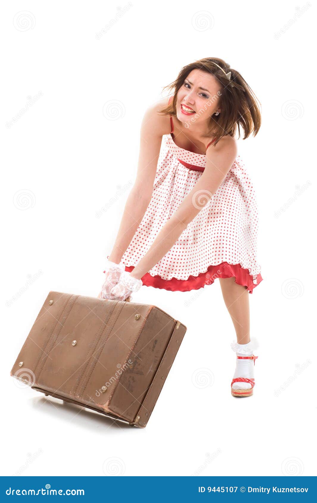 Moving a suitcase stock image. Image of female, isolate 9445107
